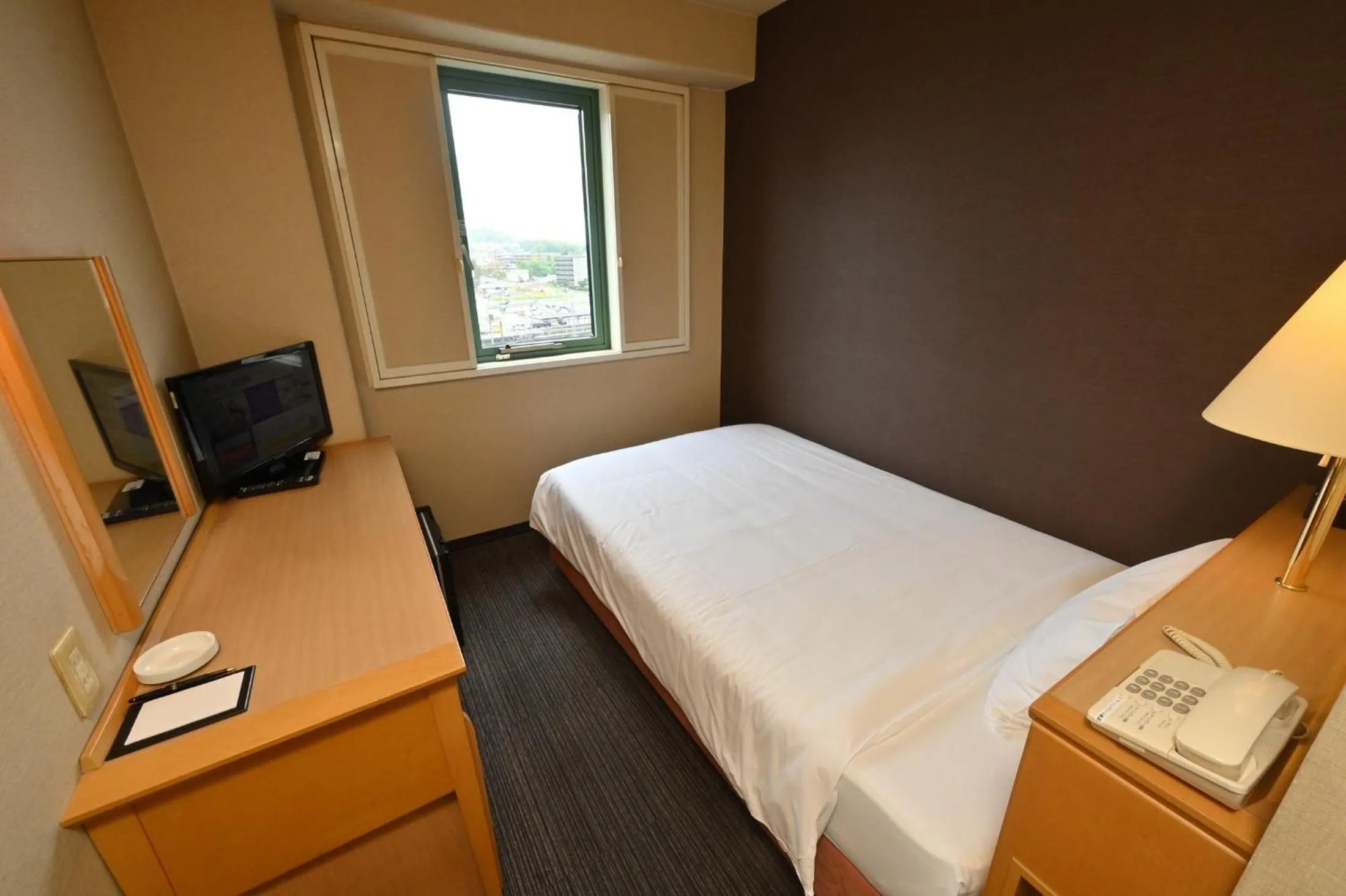 Photo of the whole room, Bed in Sanco Inn Kuwana Ekimae