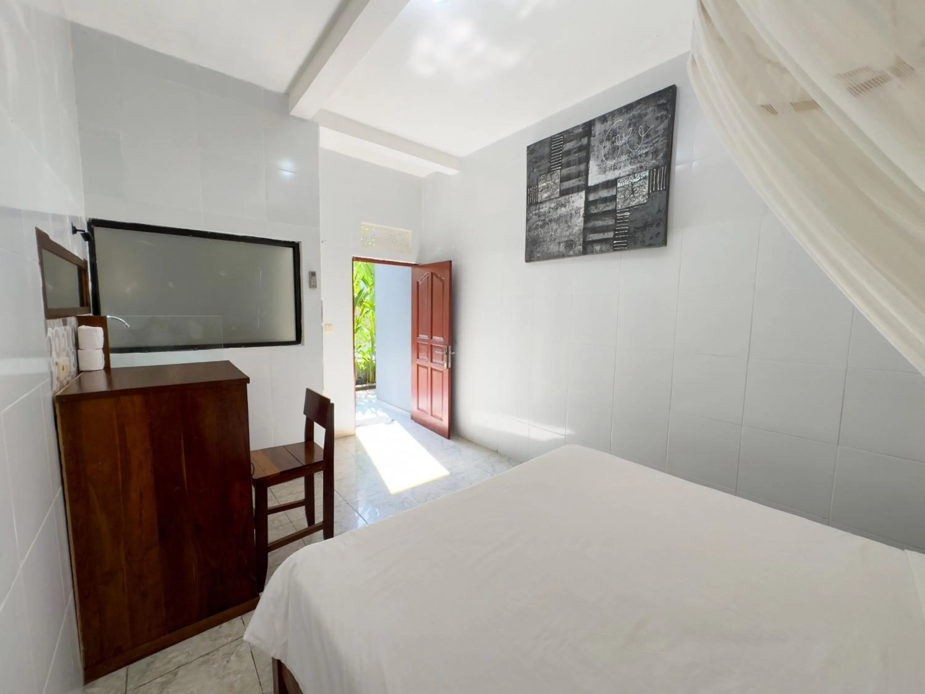 Bed in Batu Kandik Homestay