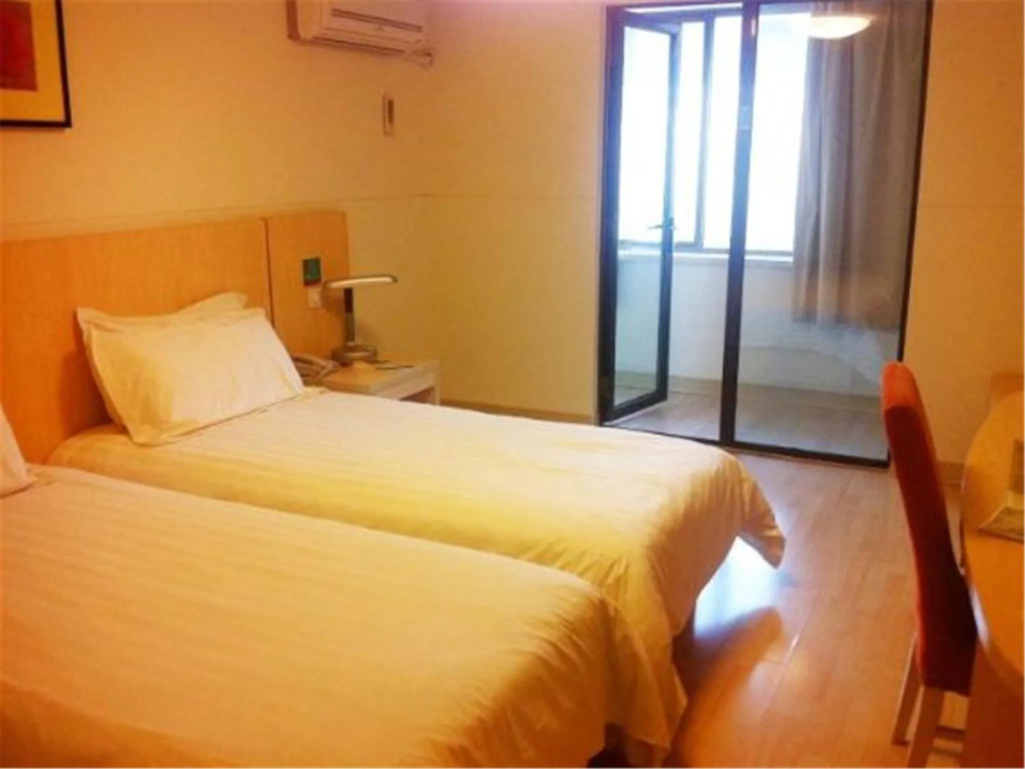 Bed in Jinjiang Inn - Qingdao Zhongshan Road