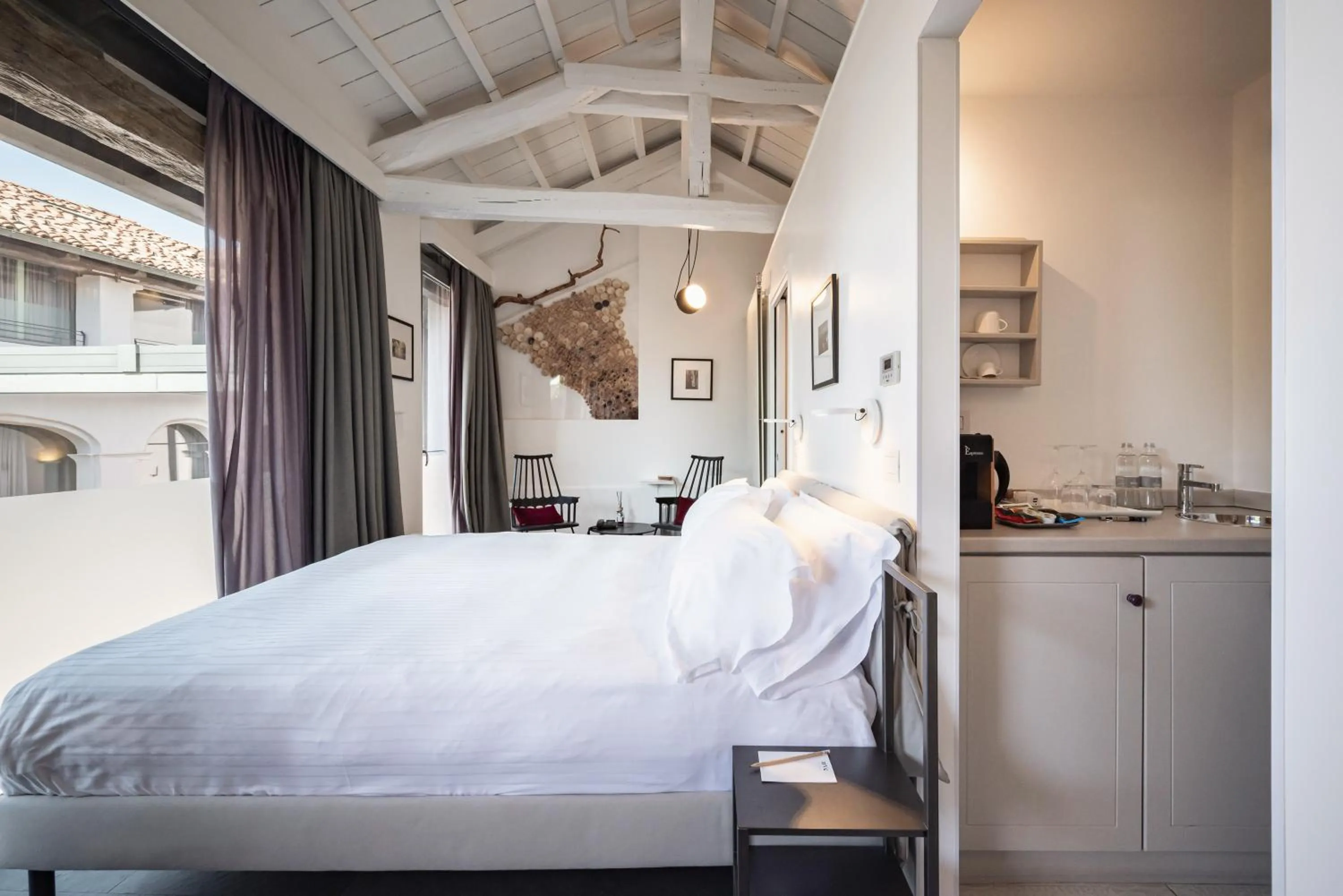 Decorative detail, Bed in Uve Rooms & Wine Bar