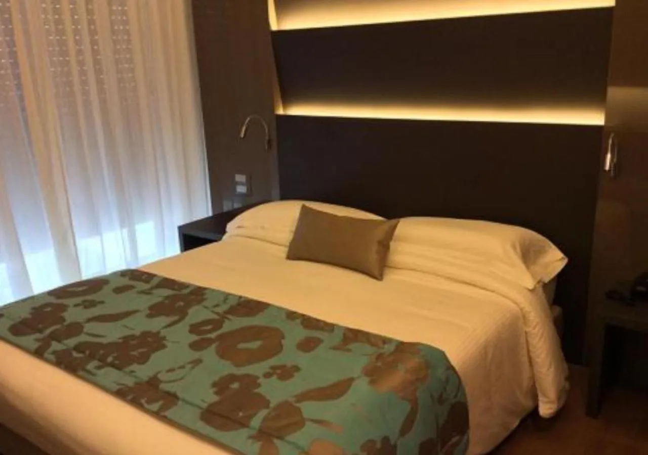 Bed in Hotel Ariston & Apartments