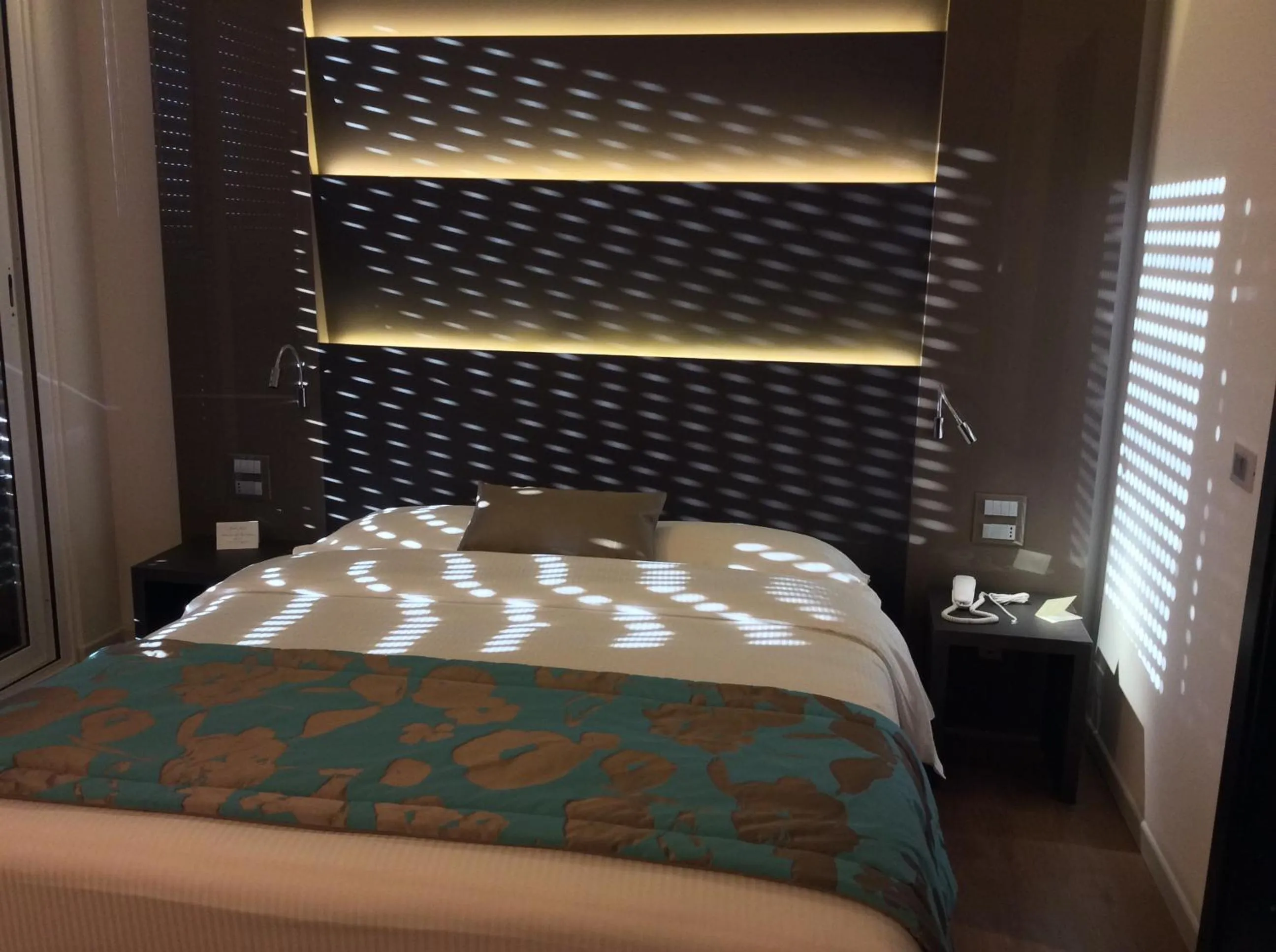 Decorative detail, Bed in Hotel Ariston & Apartments