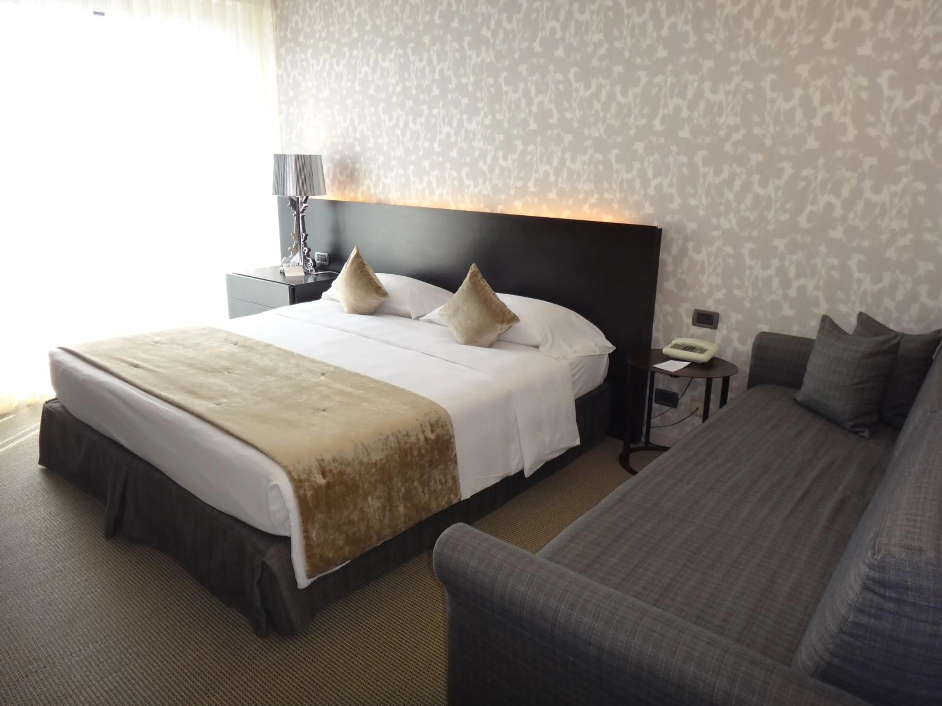 Bed in Hotel Ariston & Apartments