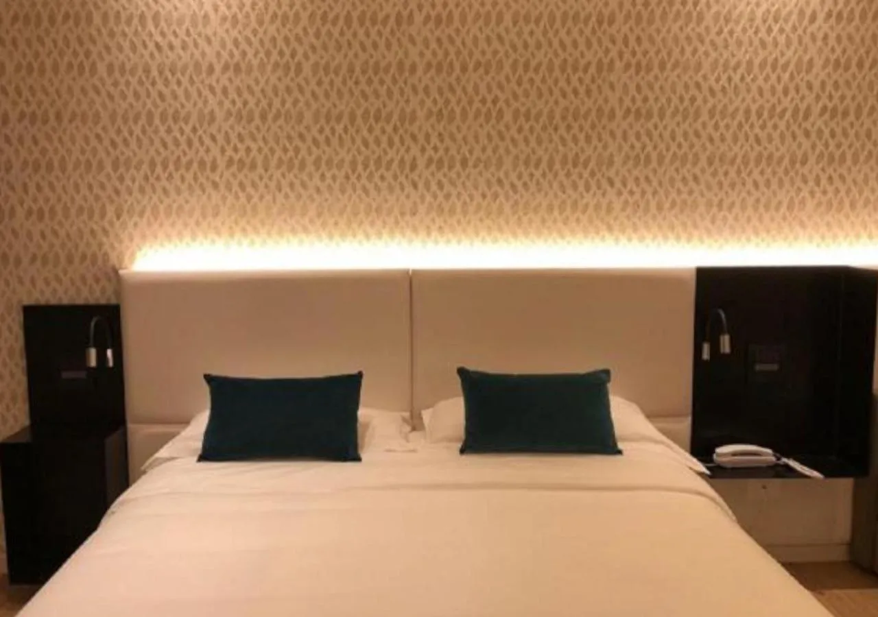 Bed in Hotel Ariston & Apartments