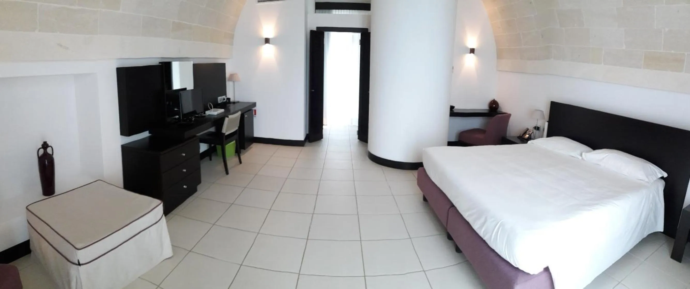 Bed in Masseria Bagnara Resort & Spa