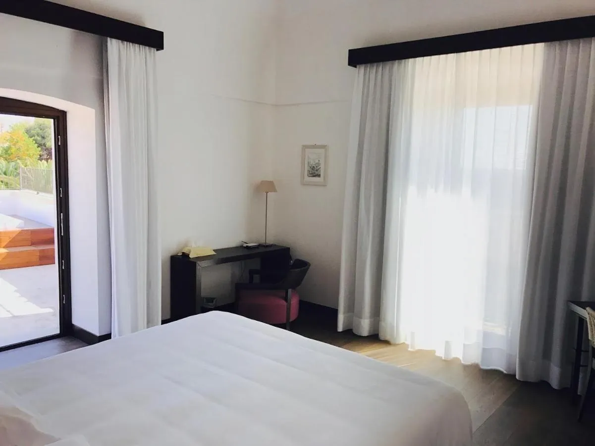 Photo of the whole room, Bed in Masseria Bagnara Resort & Spa