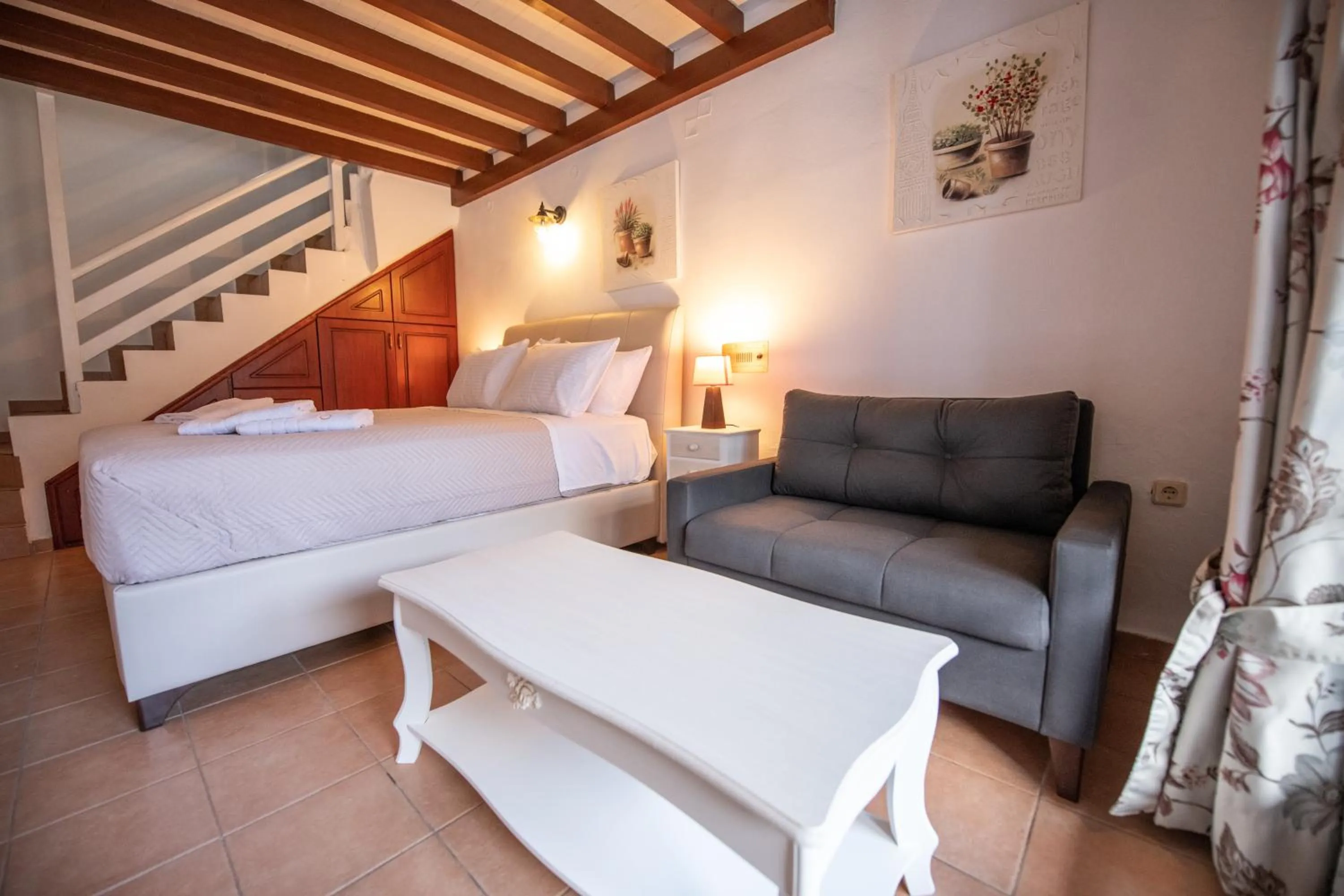 Bed in Hovolo Hotel Apartments