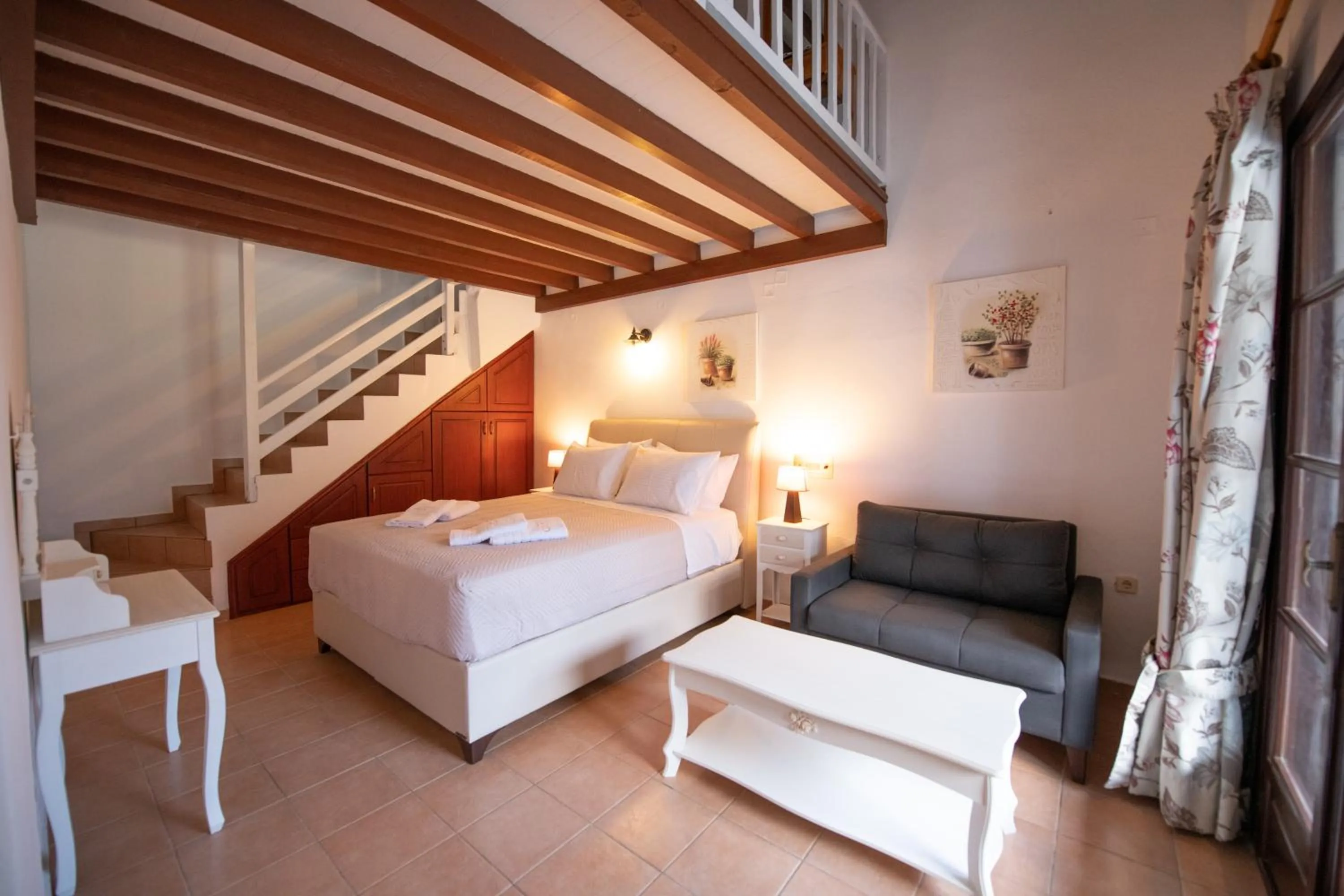 Bed in Hovolo Hotel Apartments