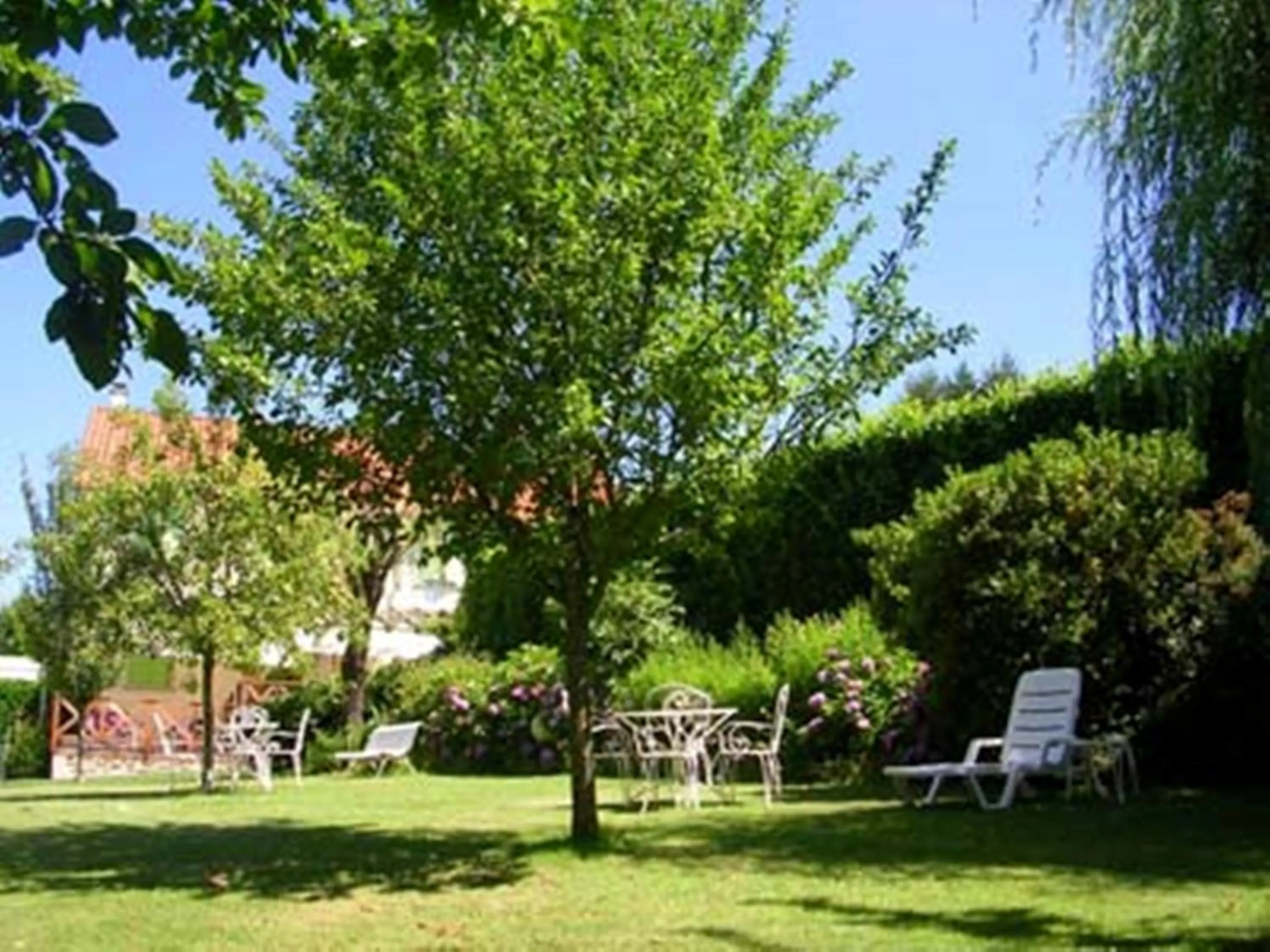 Garden in Auberge La Tomette, The Originals Relais