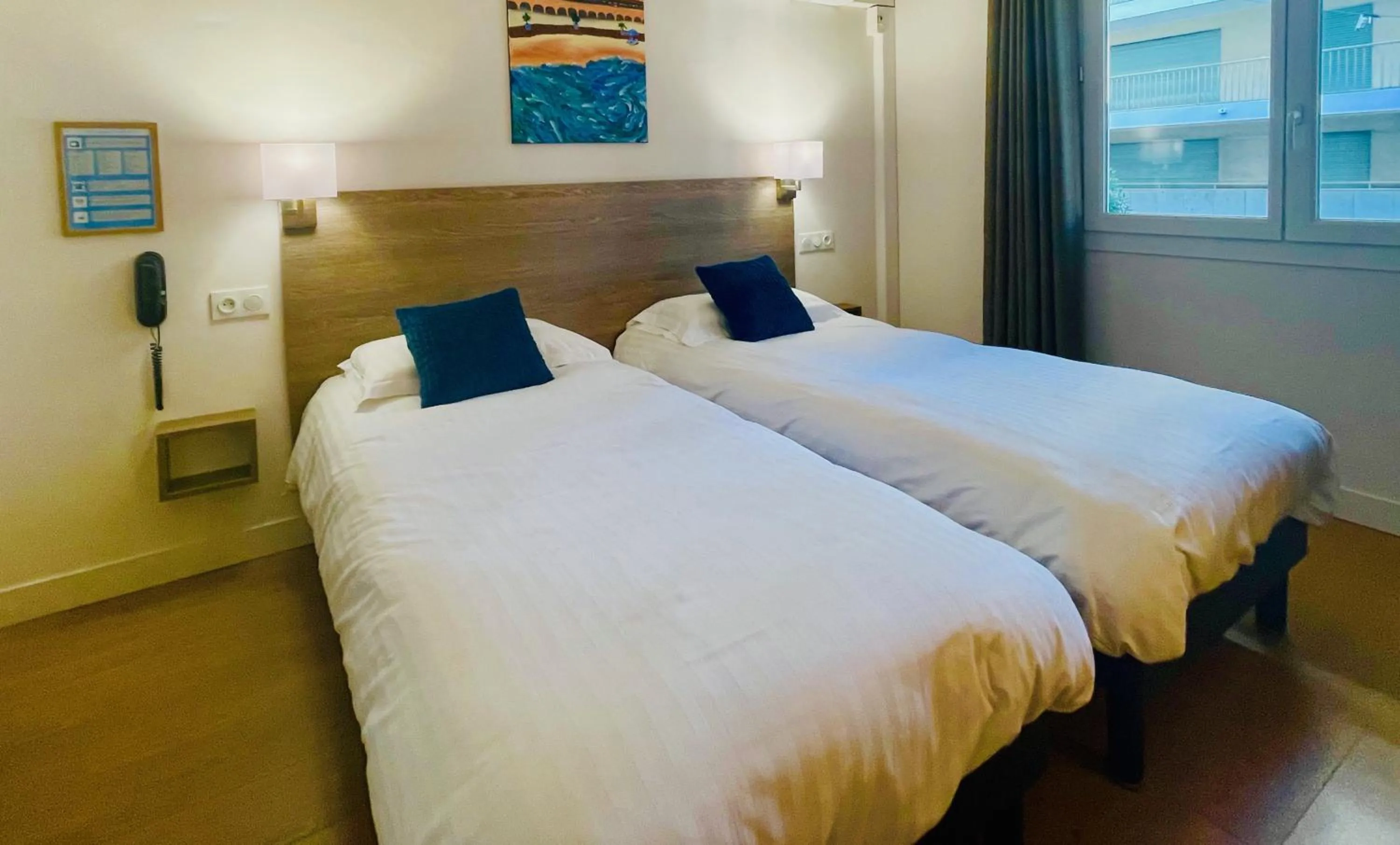 Bed in Hotel Courbet