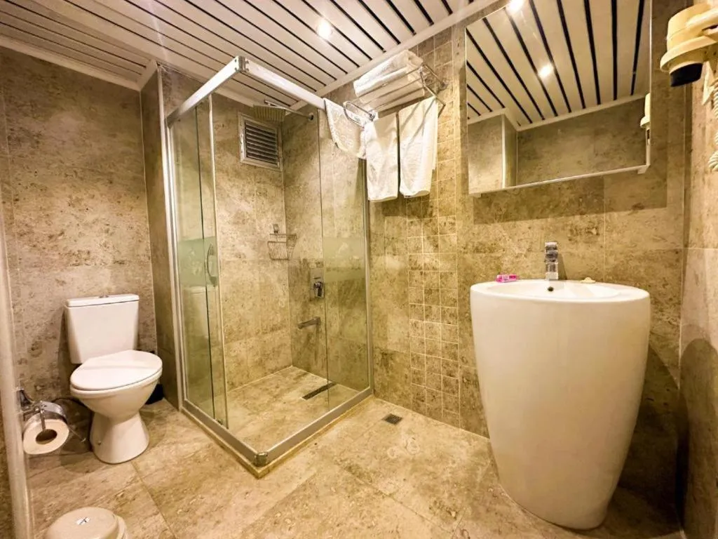 Shower in Happy Apart Hotel