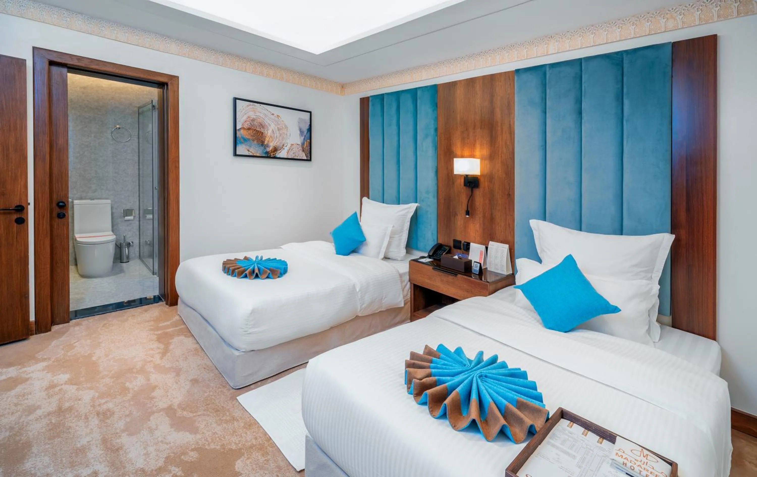 Bed in Madareem Hotel