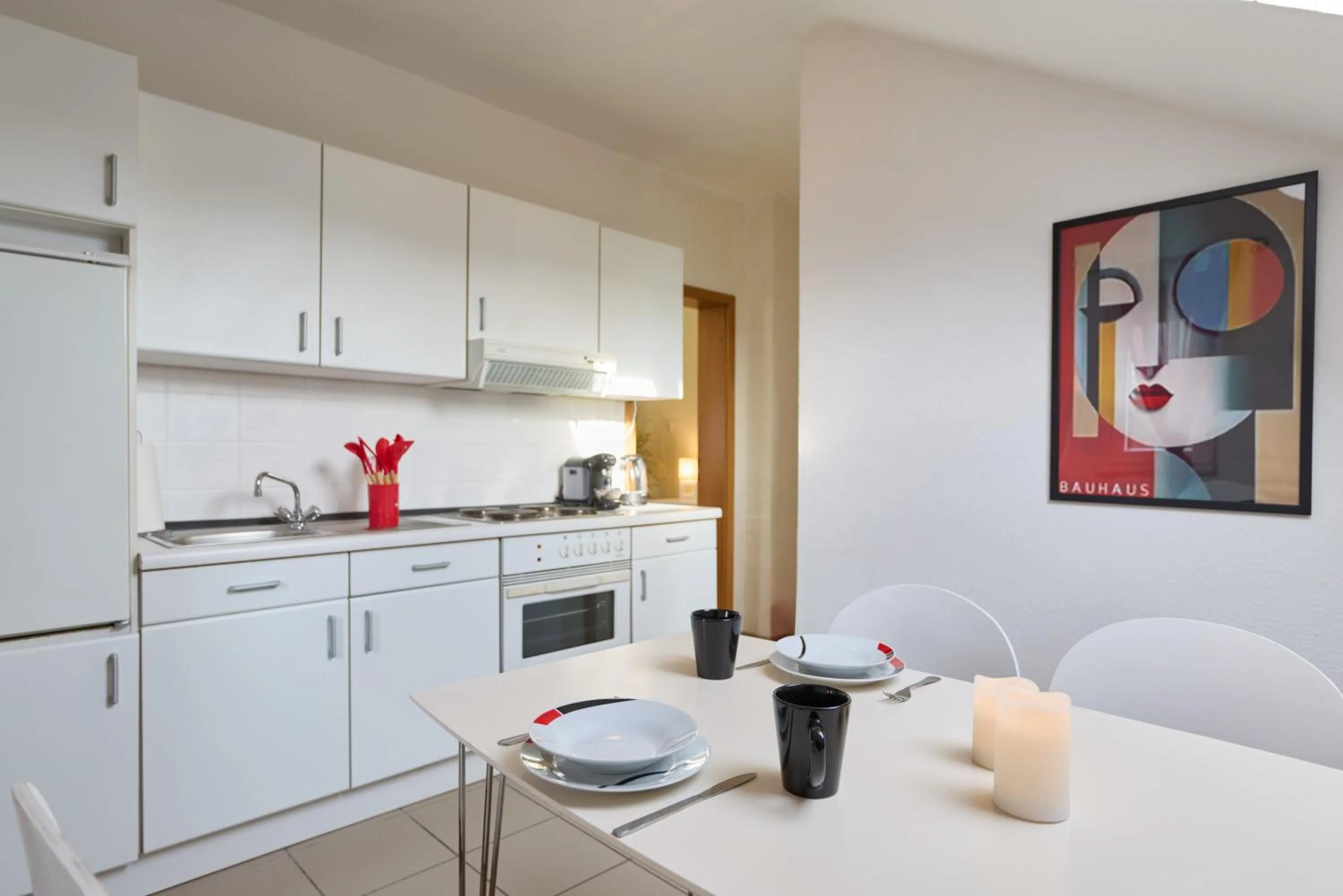 Kitchen or kitchenette in arador CITY Hotel