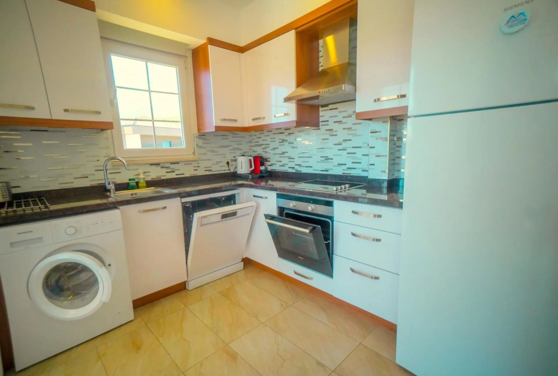 dishwasher in Sweet Home Kemer Apartments