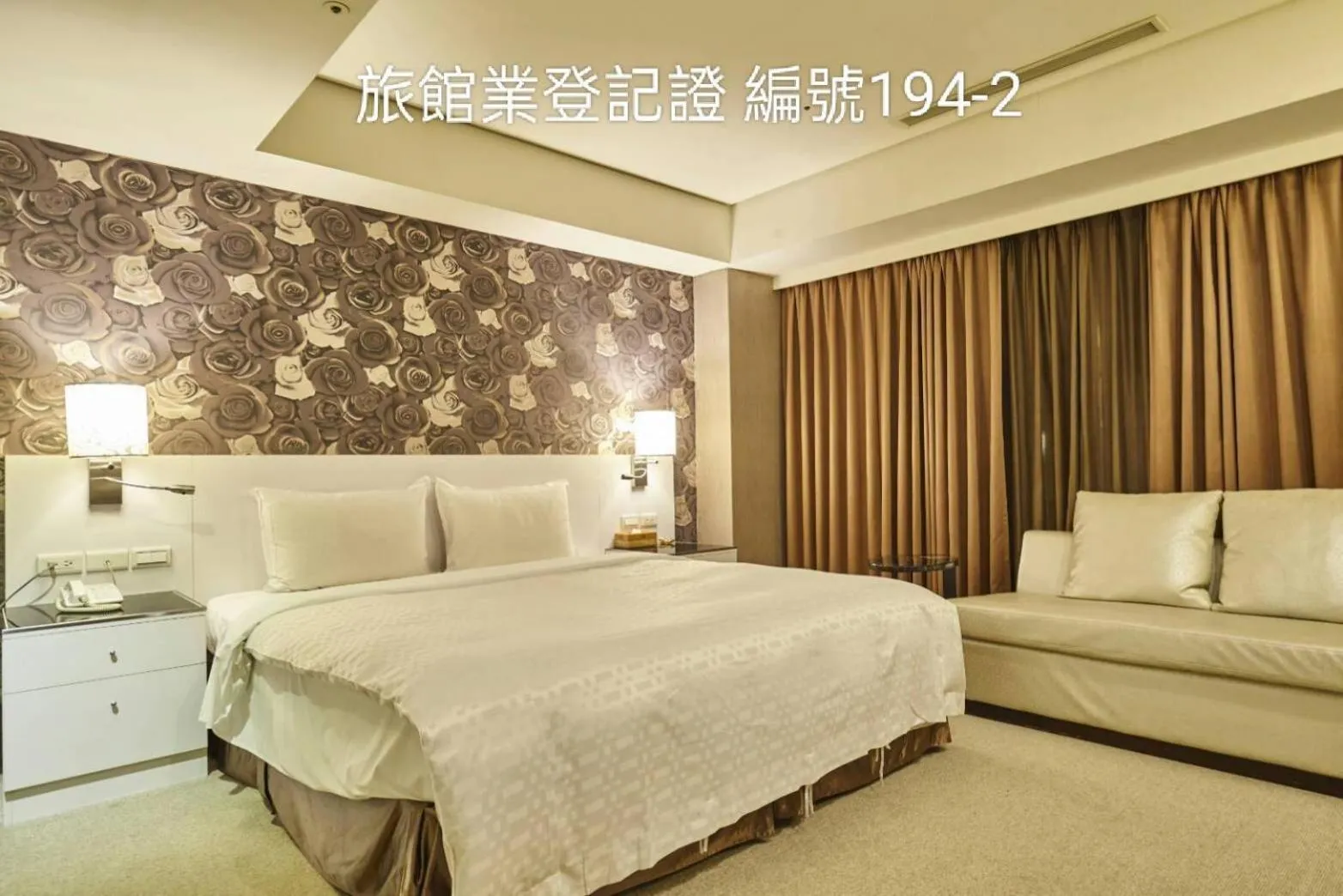 Bed in Family Hotel Taipei