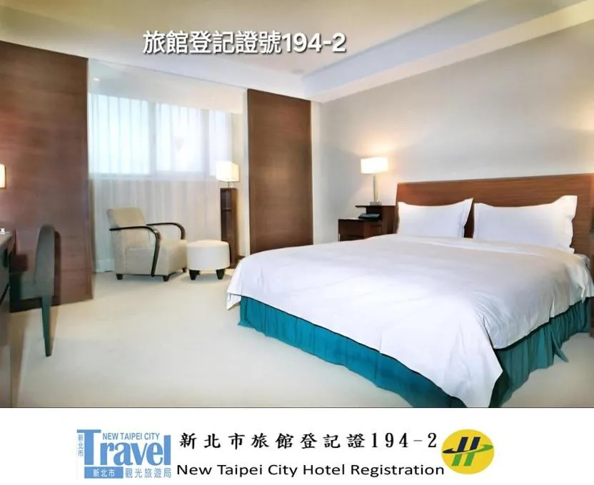 Bed in Family Hotel Taipei