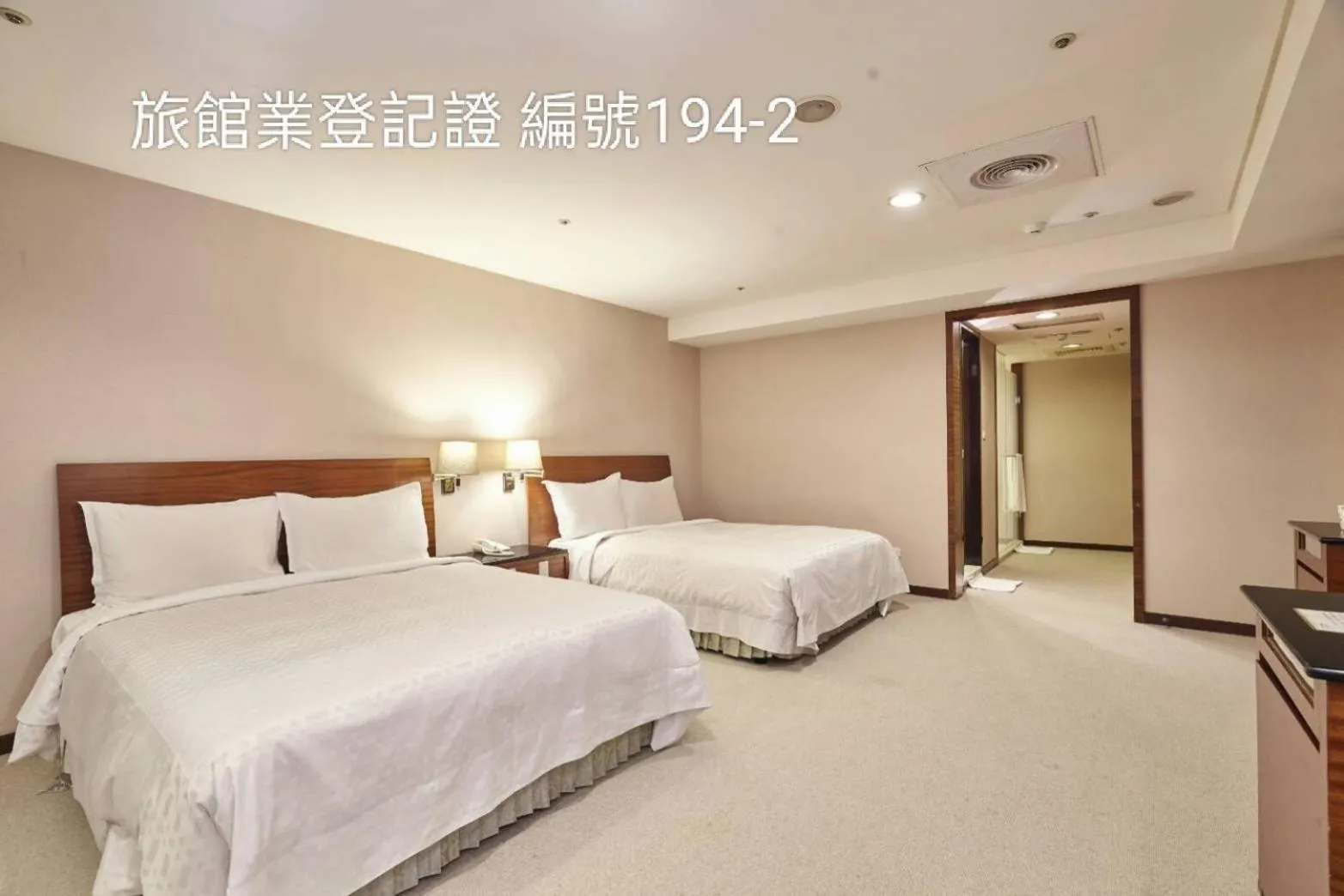 Bed in Family Hotel Taipei