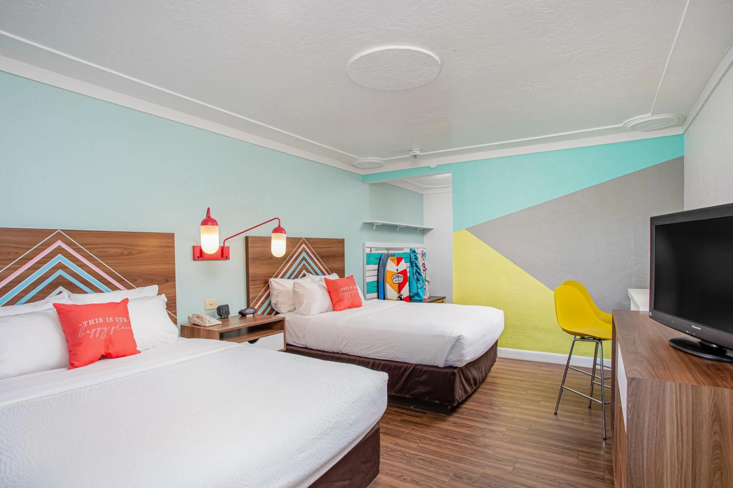 Bed in Beachside Hotel & Suites Cocoa Beach - Port Canaveral