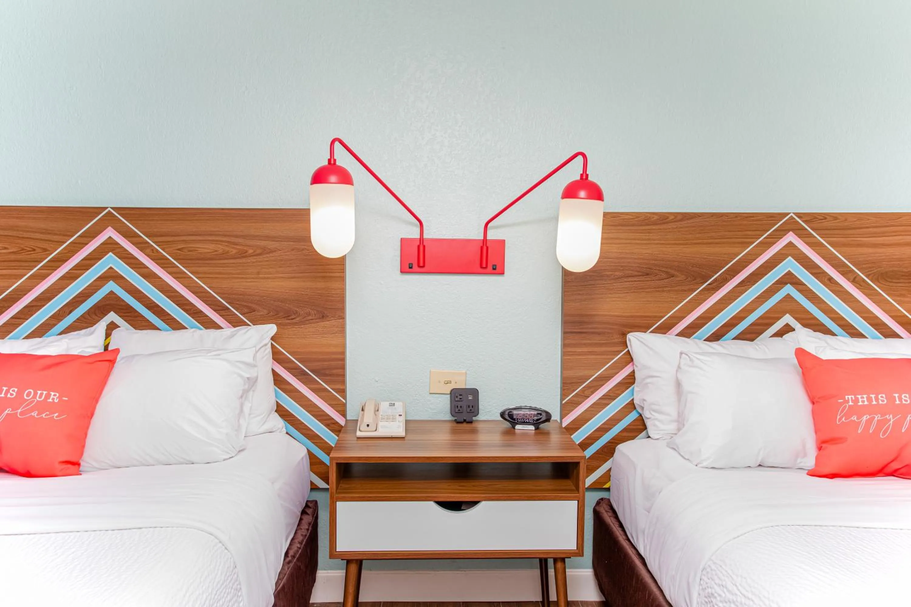 Bed in Beachside Hotel & Suites Cocoa Beach - Port Canaveral