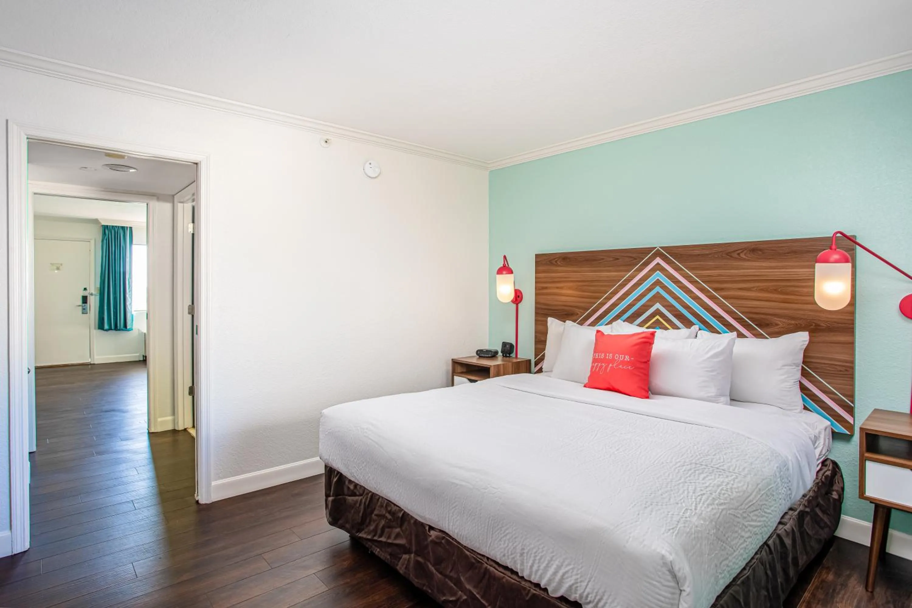 Bed in Beachside Hotel & Suites Cocoa Beach - Port Canaveral