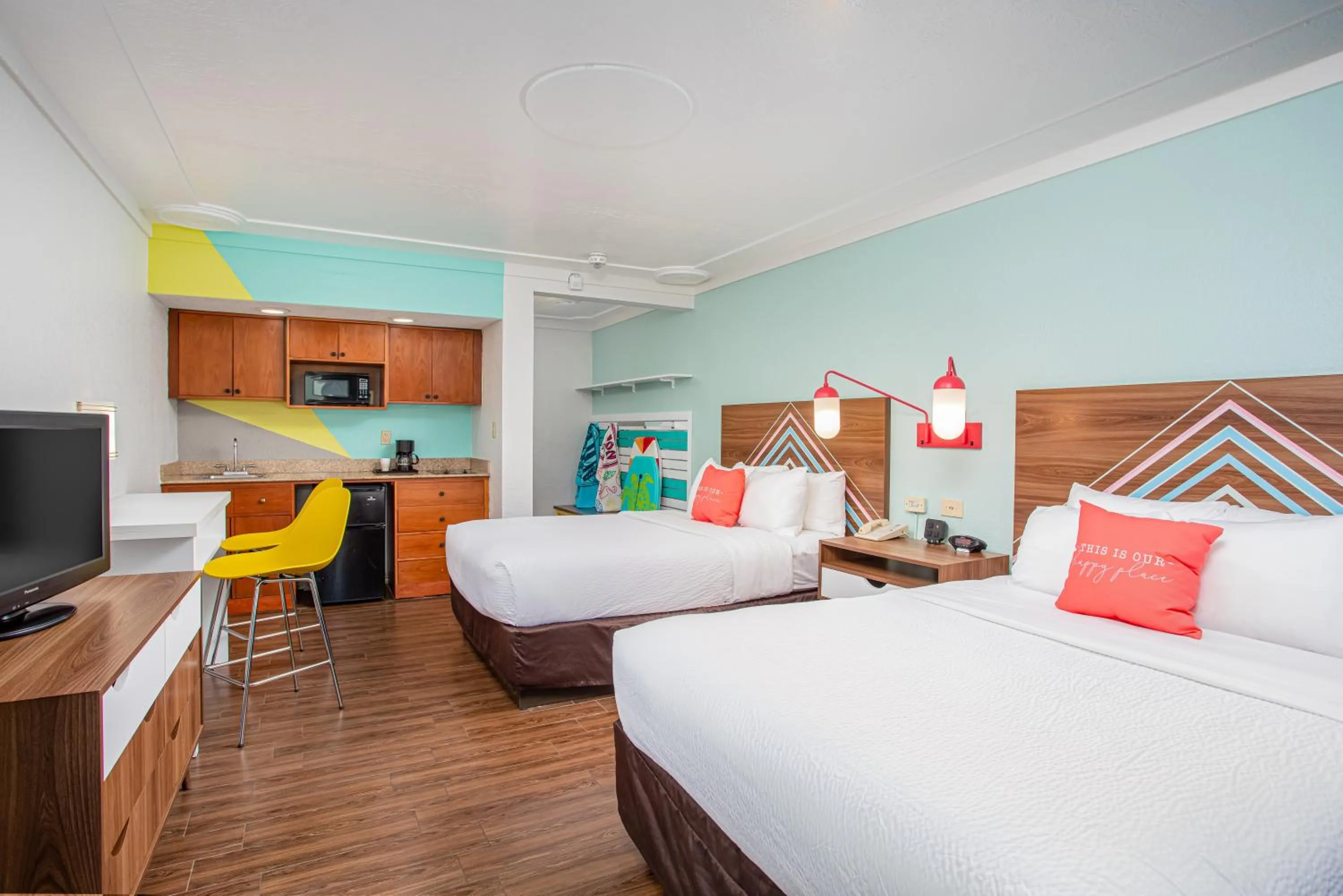 Bed in Beachside Hotel & Suites Cocoa Beach - Port Canaveral