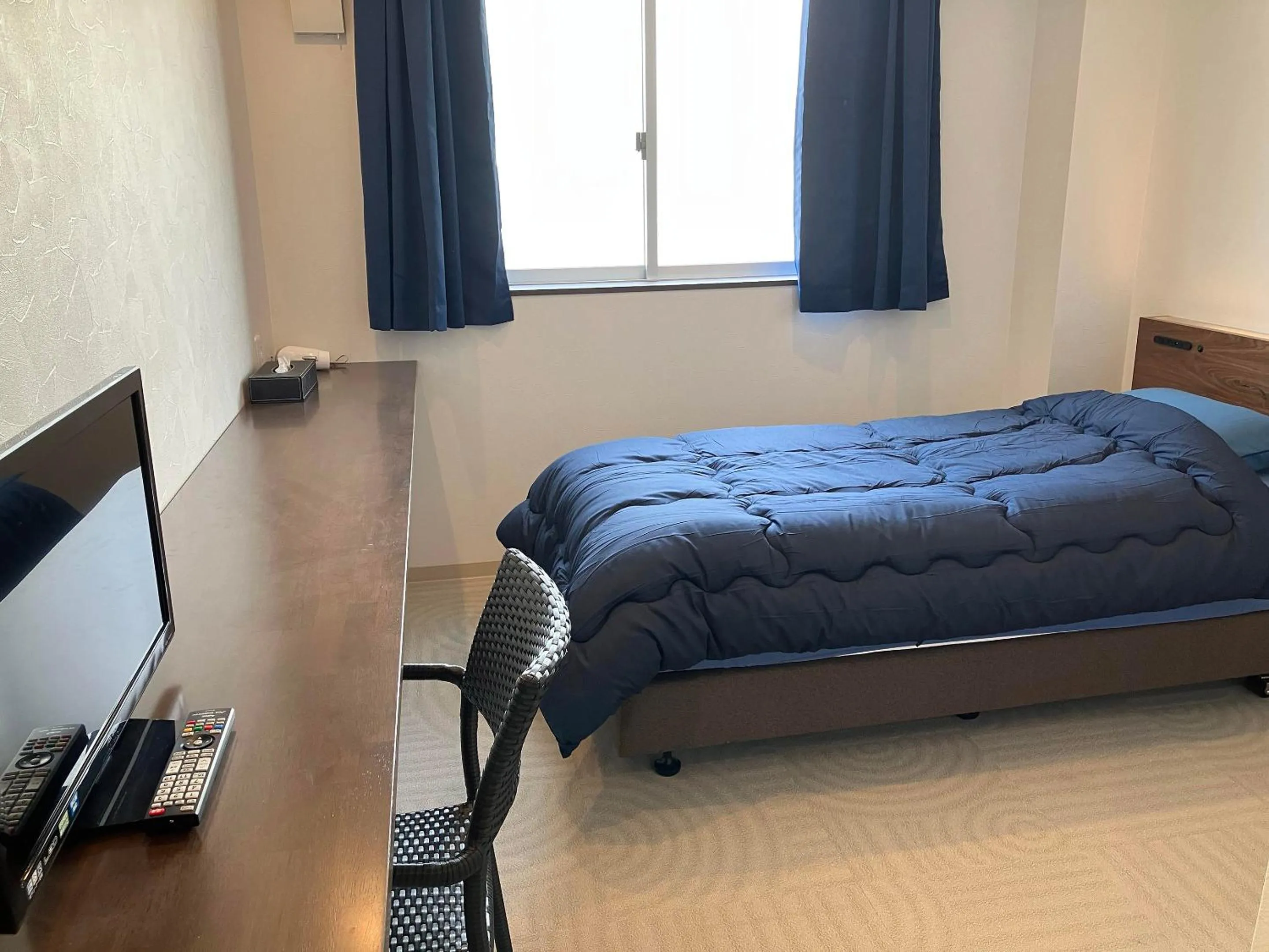 Bed in HOTEL PAiKAJi