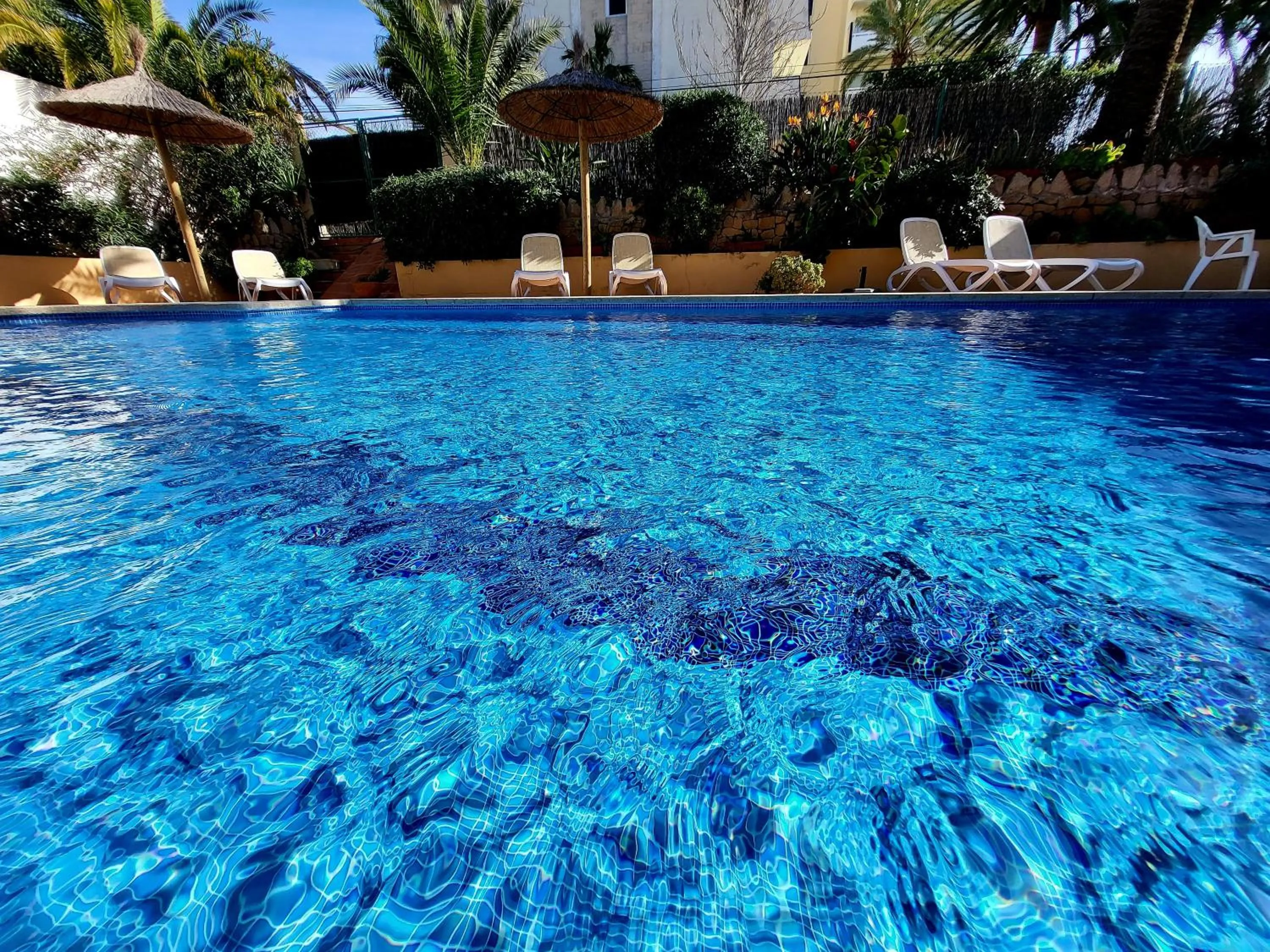 Swimming pool in Hostal Bahía Azul