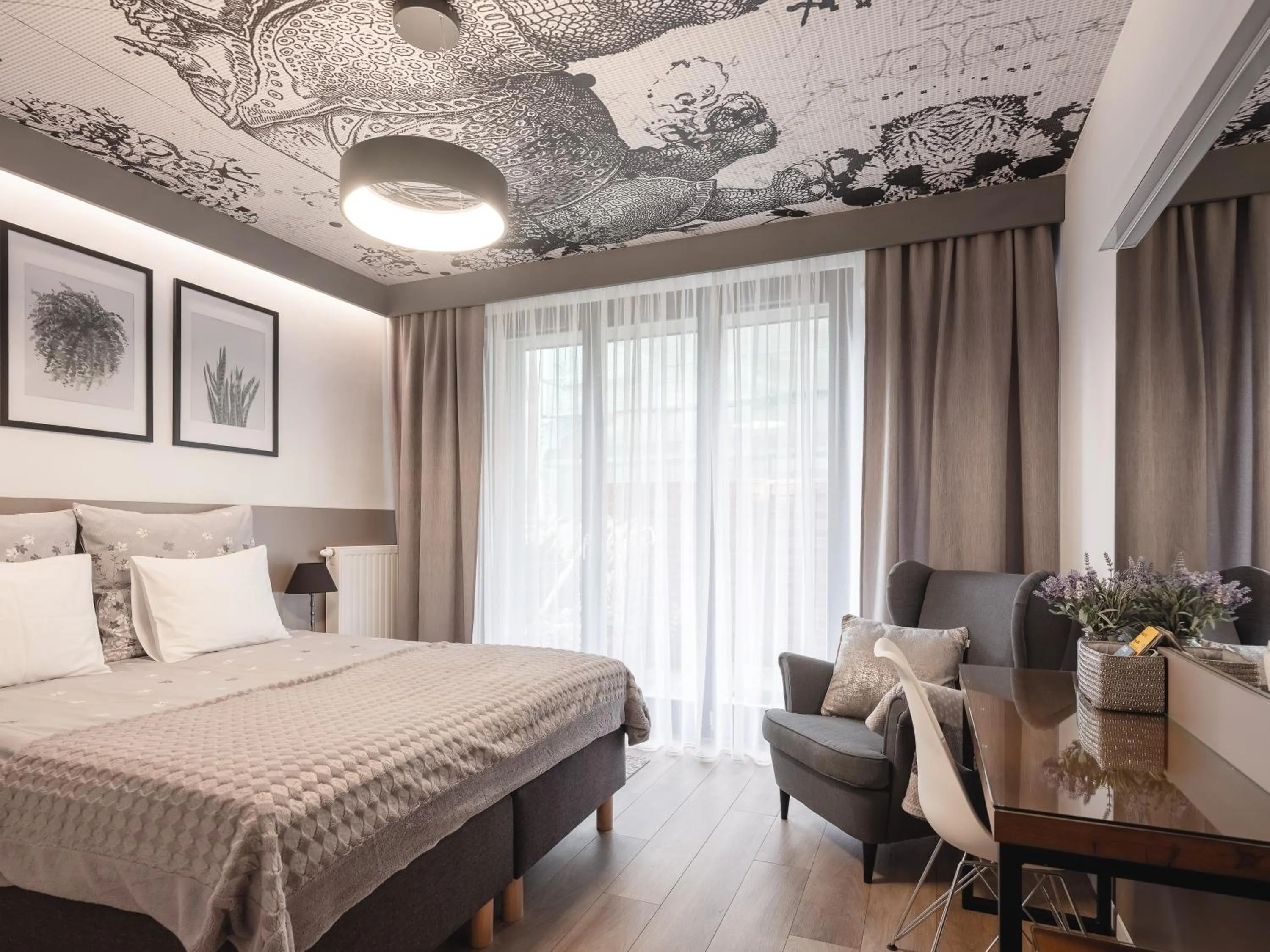 Bed in Jacuzzi Apartments