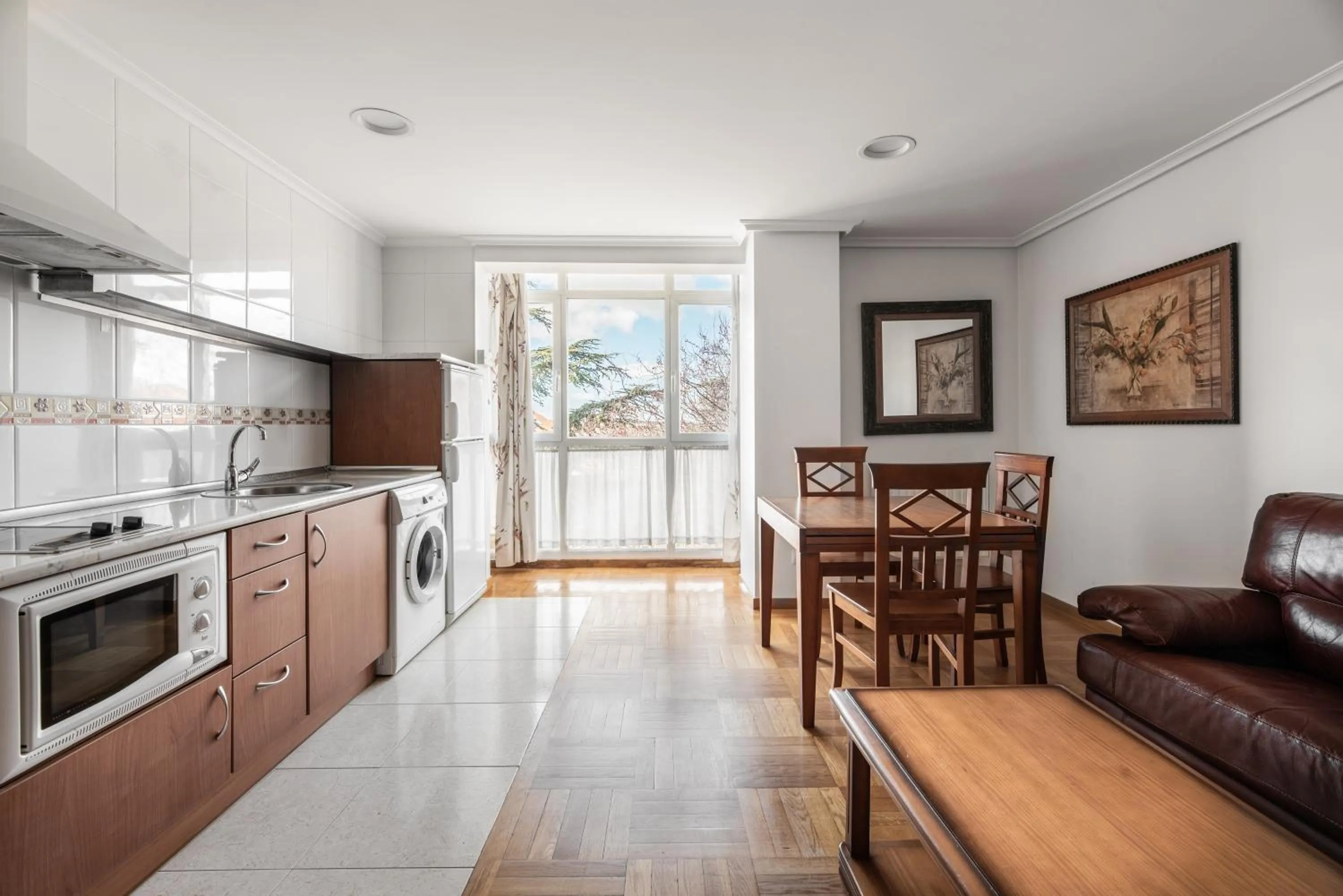 Kitchen or kitchenette in Apartamentos El Cid