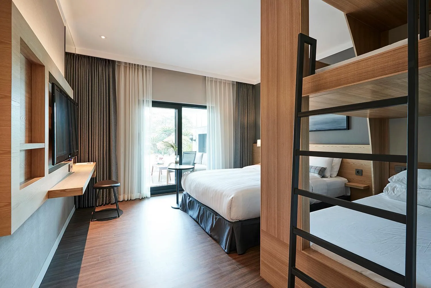 Bed in The Suites Hotel Jeju