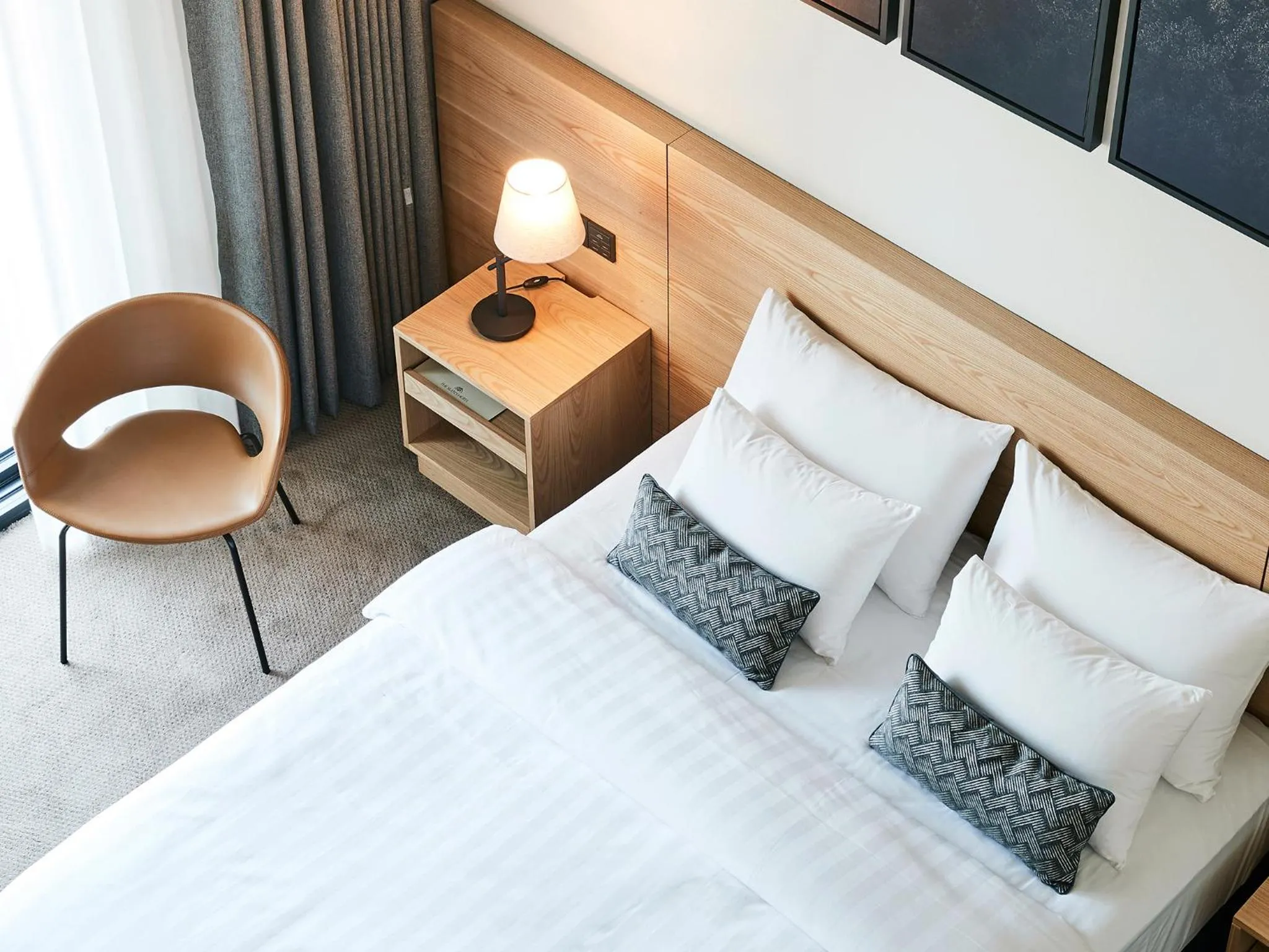 Bed in The Suites Hotel Jeju