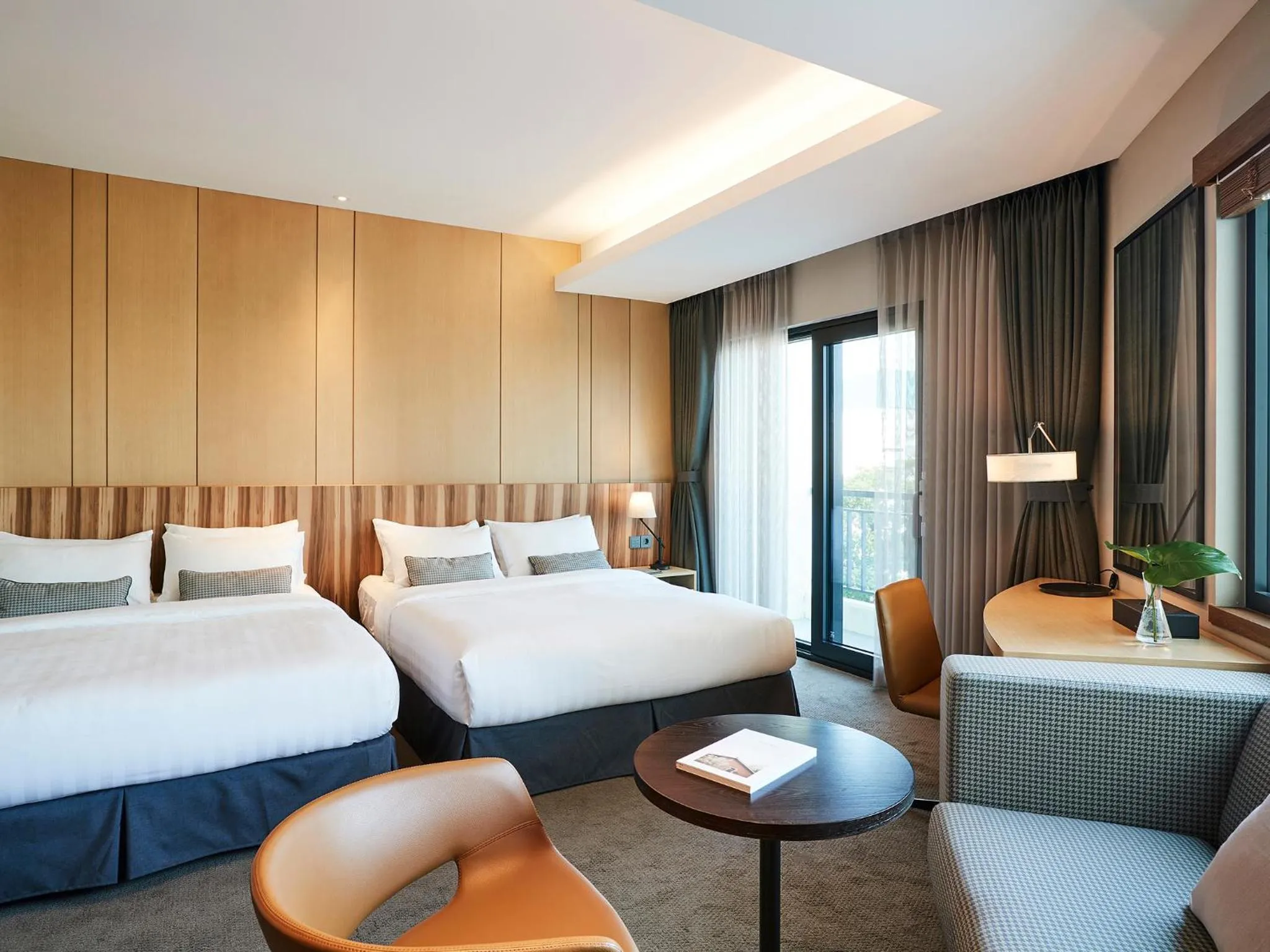 Bed in The Suites Hotel Jeju