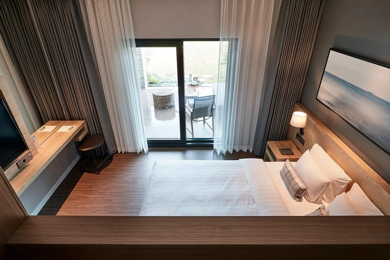 Bed in The Suites Hotel Jeju