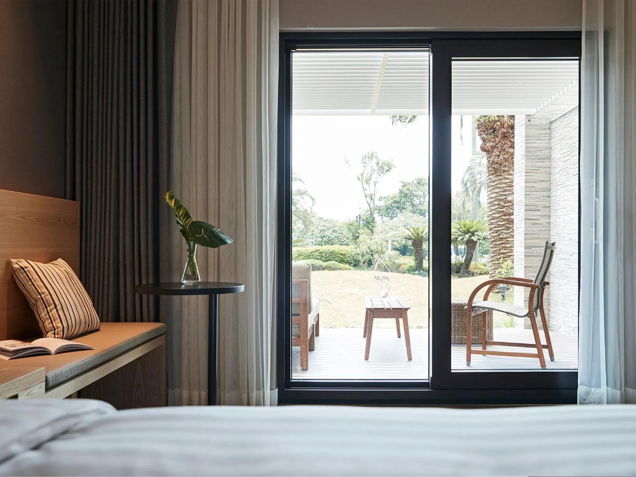 Bed in The Suites Hotel Jeju