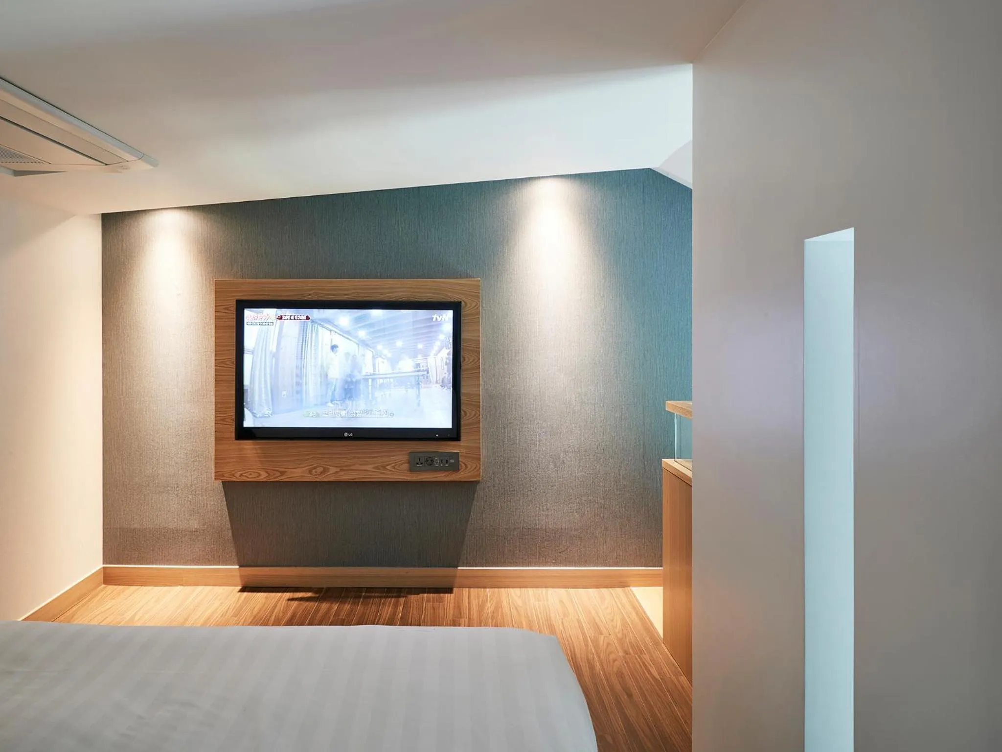 Bed in The Suites Hotel Jeju