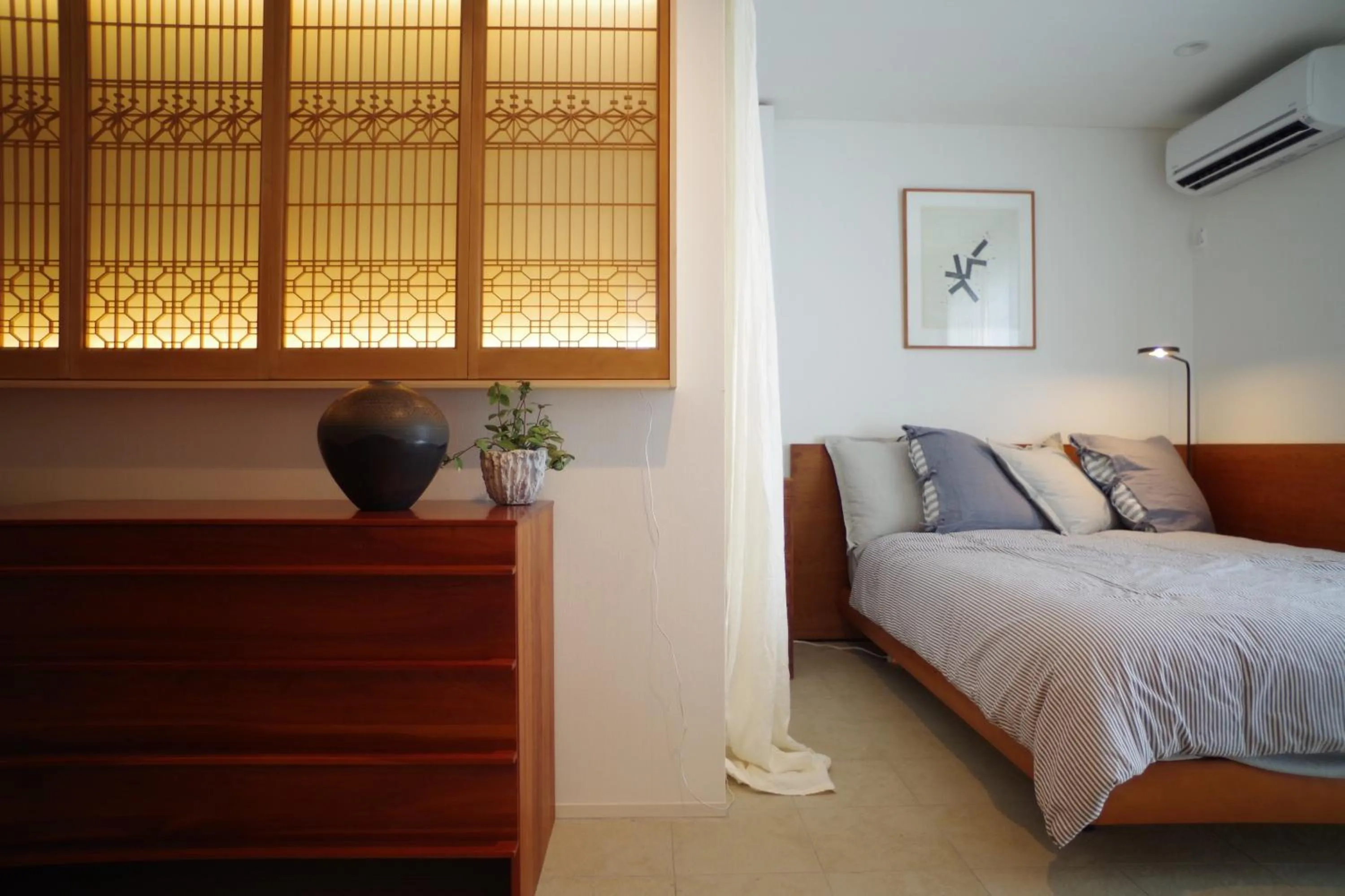 Decorative detail, Bed in Sango Katase Guest Rooms