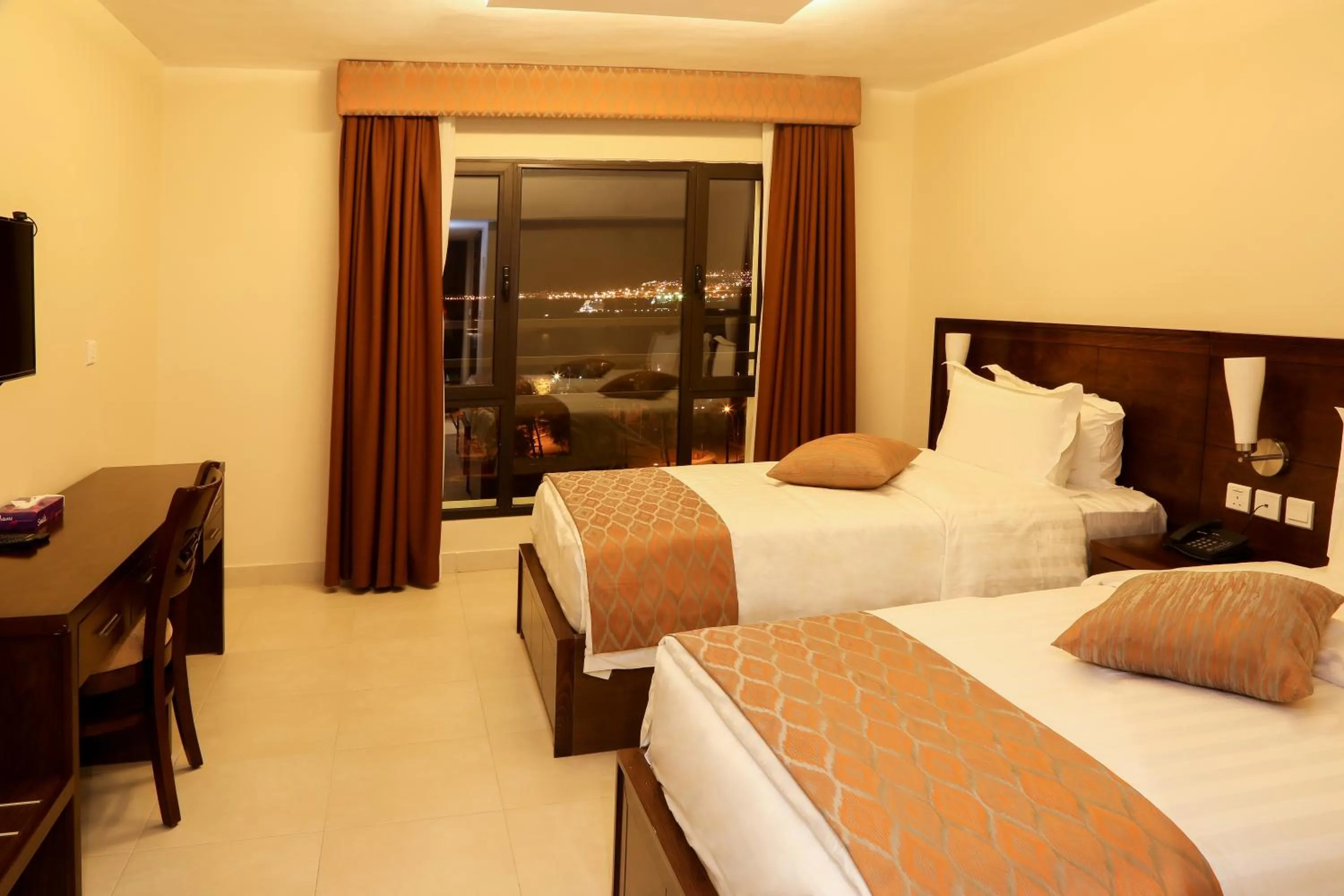 Bed in City Tower Hotel