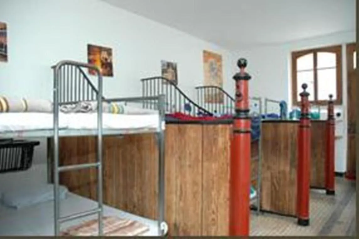 Bed in Funny Farm Backpackers