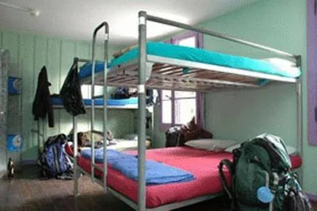 Bed in Funny Farm Backpackers