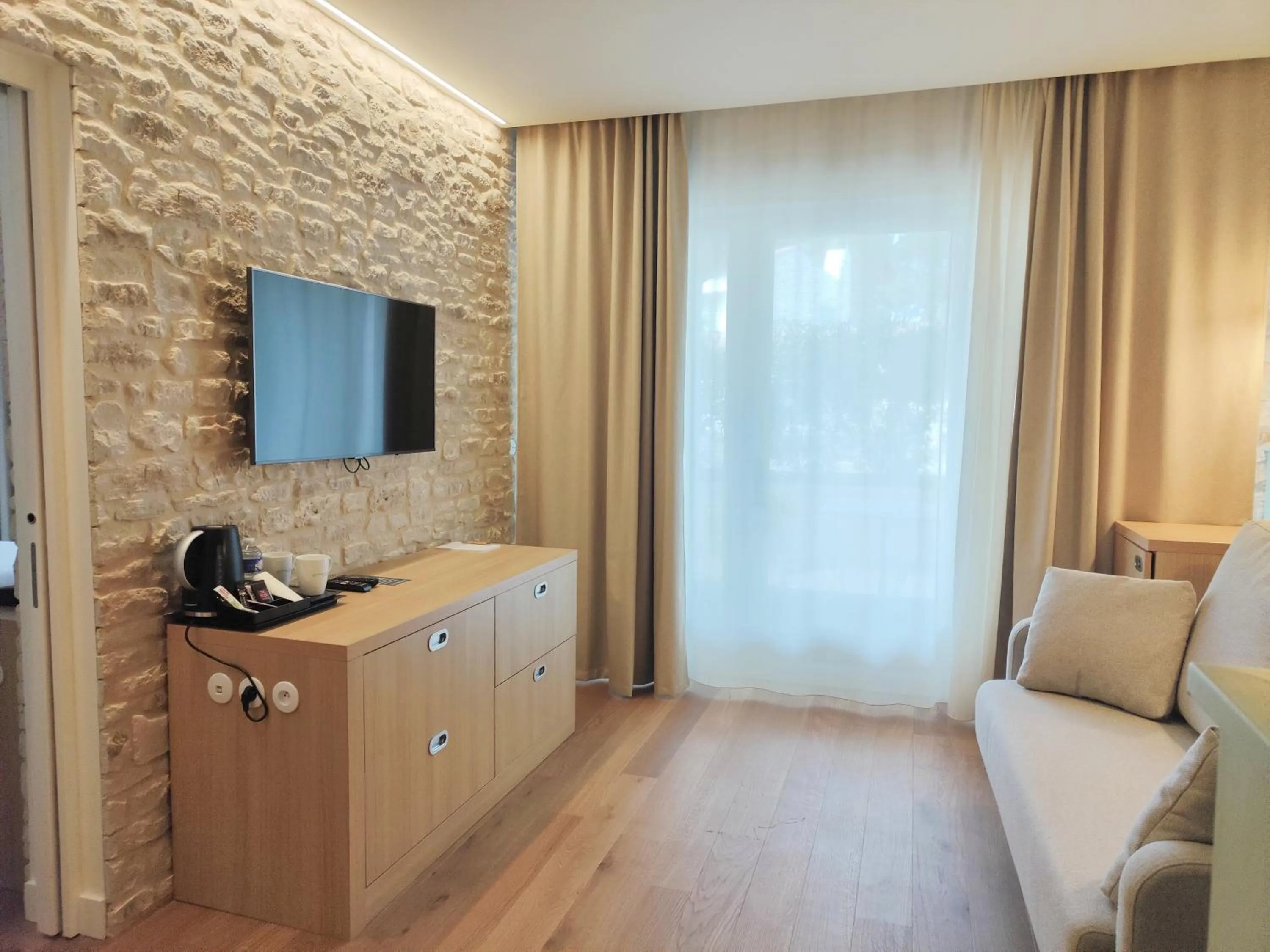 Living room in Hôtel Les Grenettes