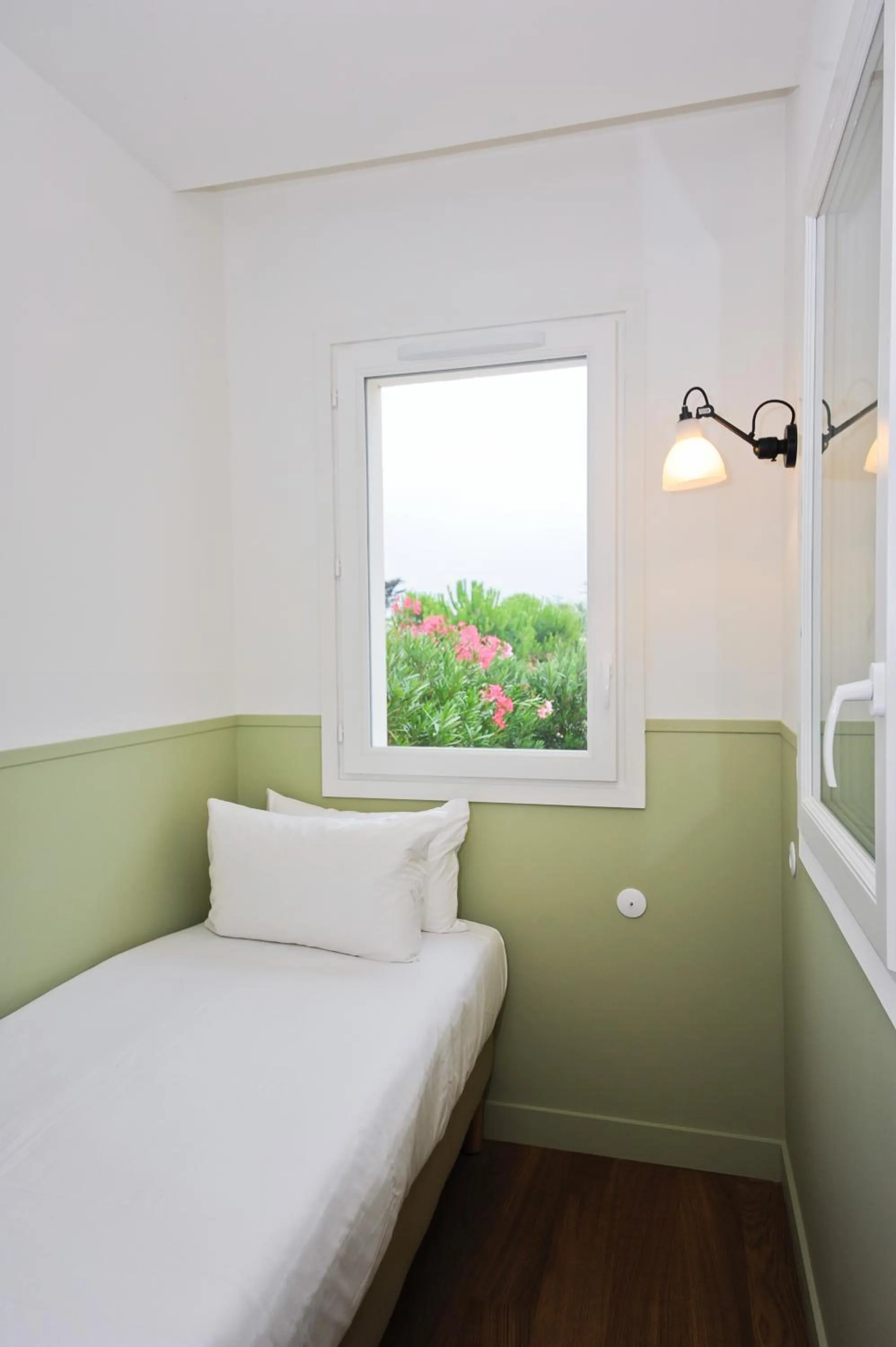 Bed in Hôtel Les Grenettes