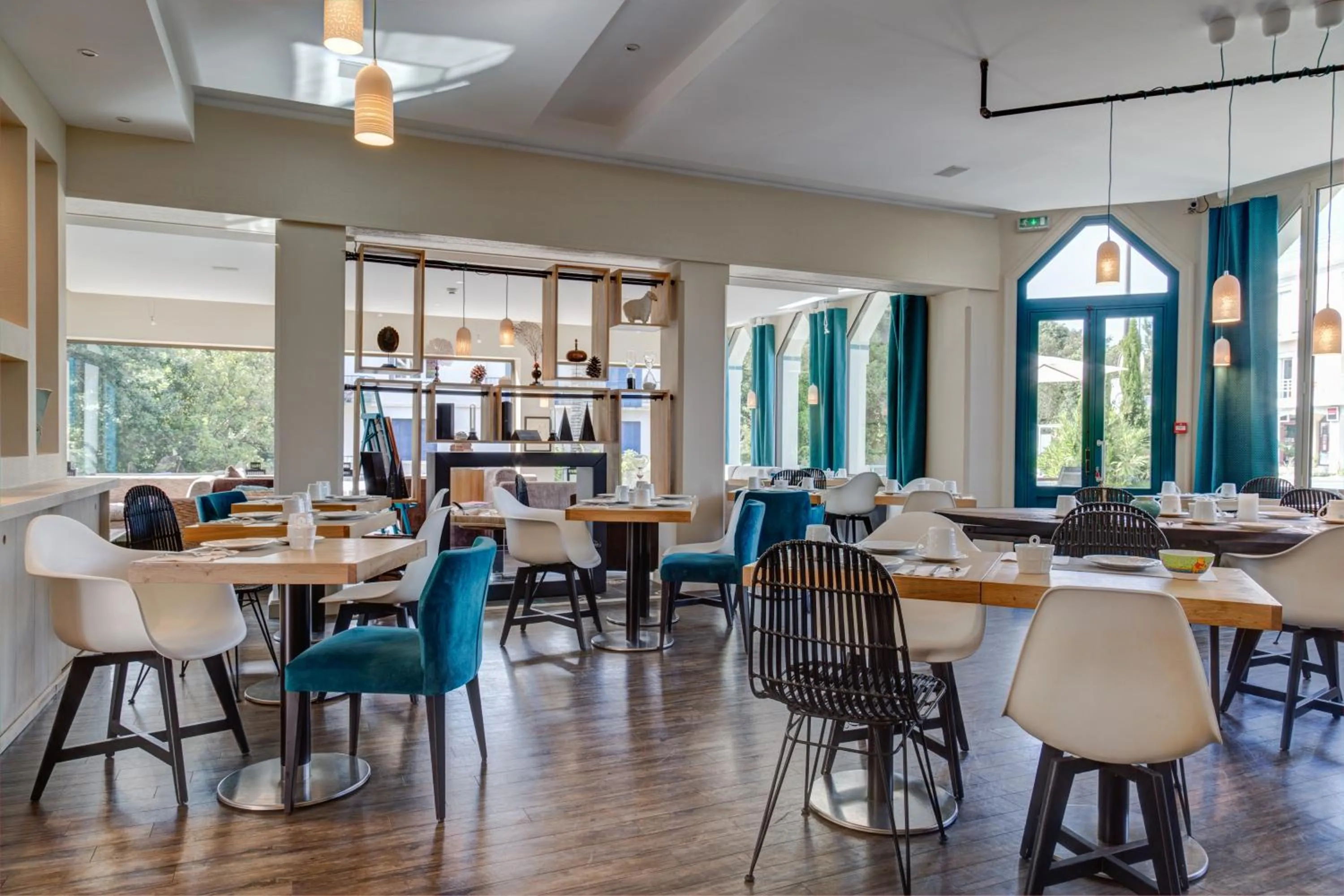 Communal lounge/ TV room in The Originals Boutique Hôtel La Villa Ouest & Spa