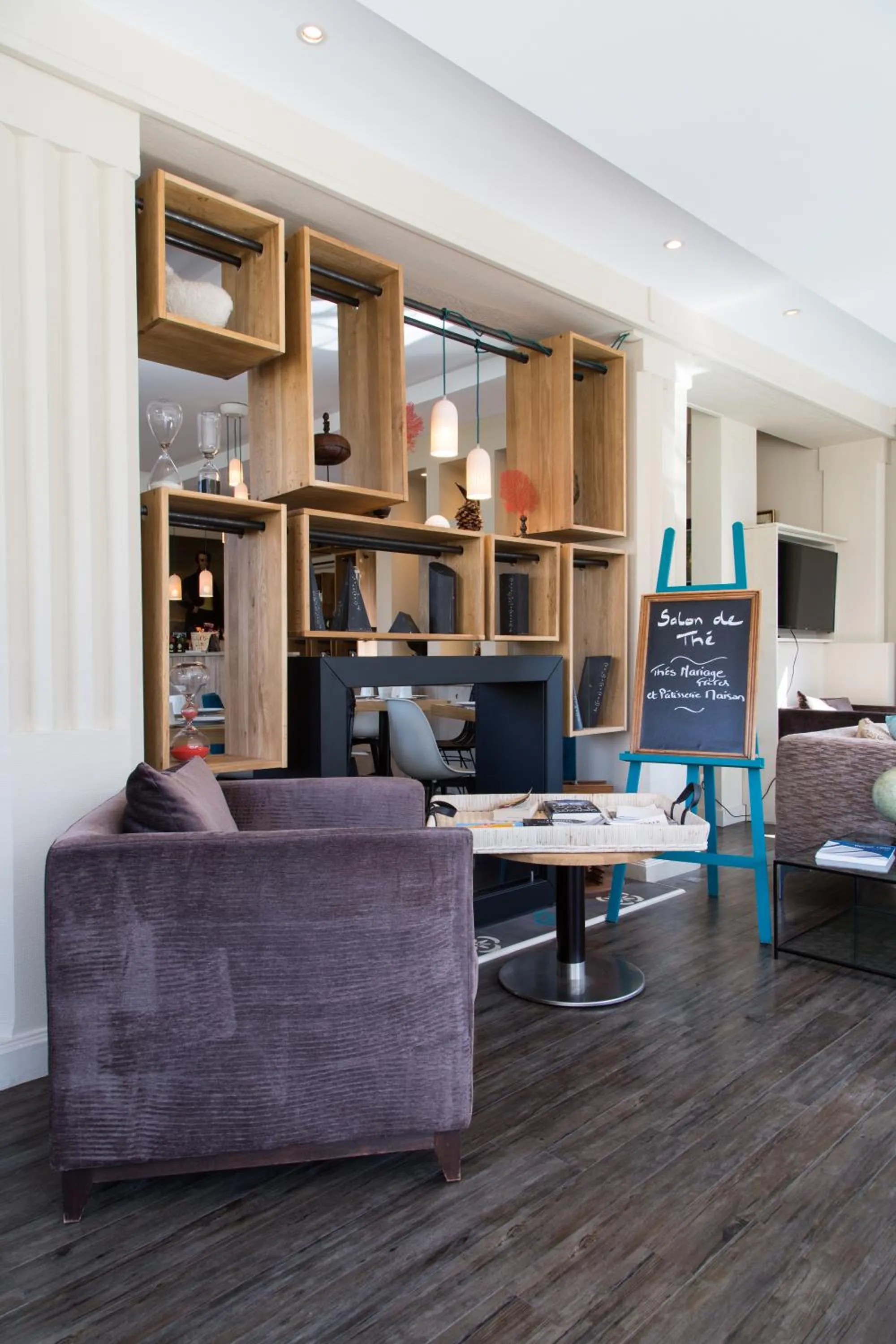 Communal lounge/ TV room in The Originals Boutique Hôtel La Villa Ouest & Spa