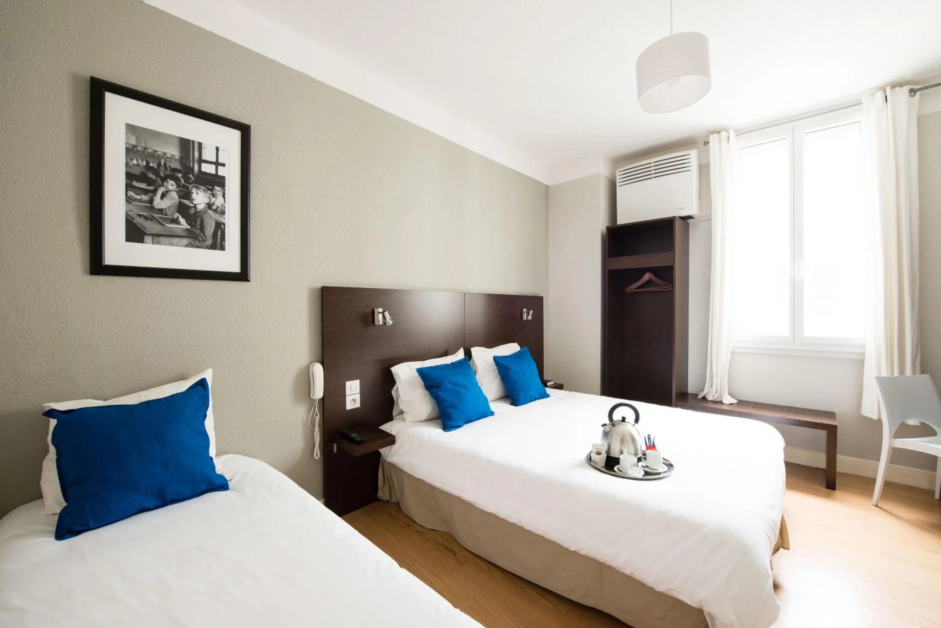 Bedroom in Hôtel Atrium