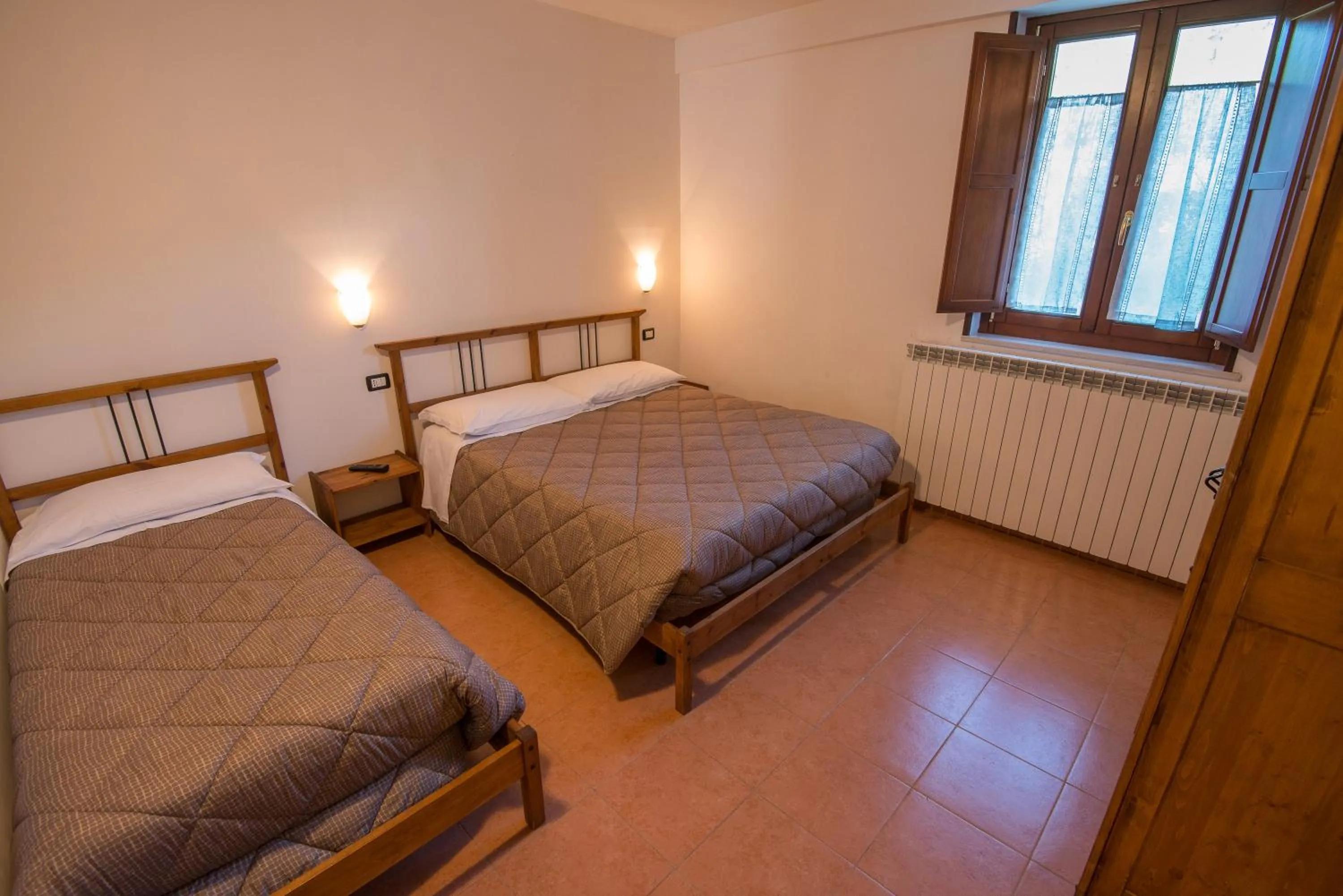 Photo of the whole room, Bed in Albergo Della Corte