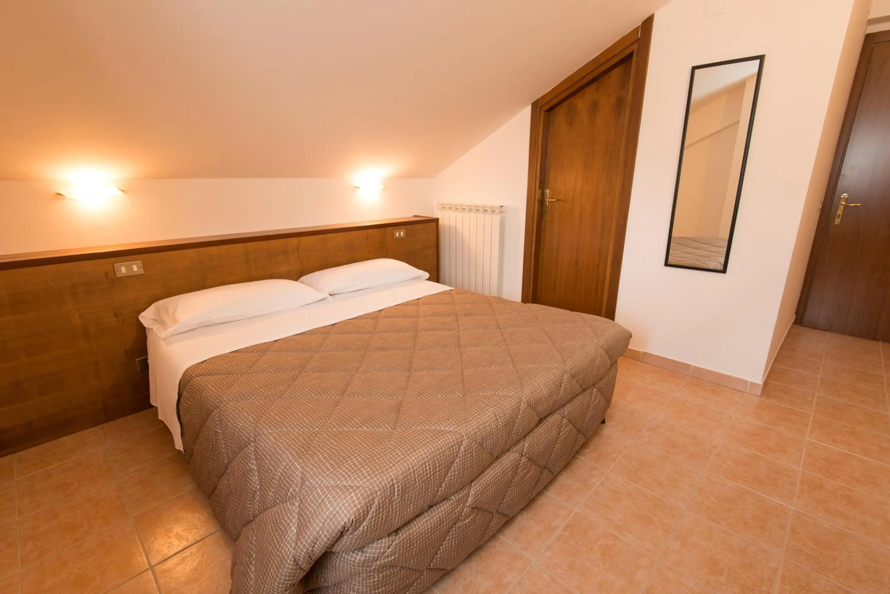 Bed in Albergo Della Corte