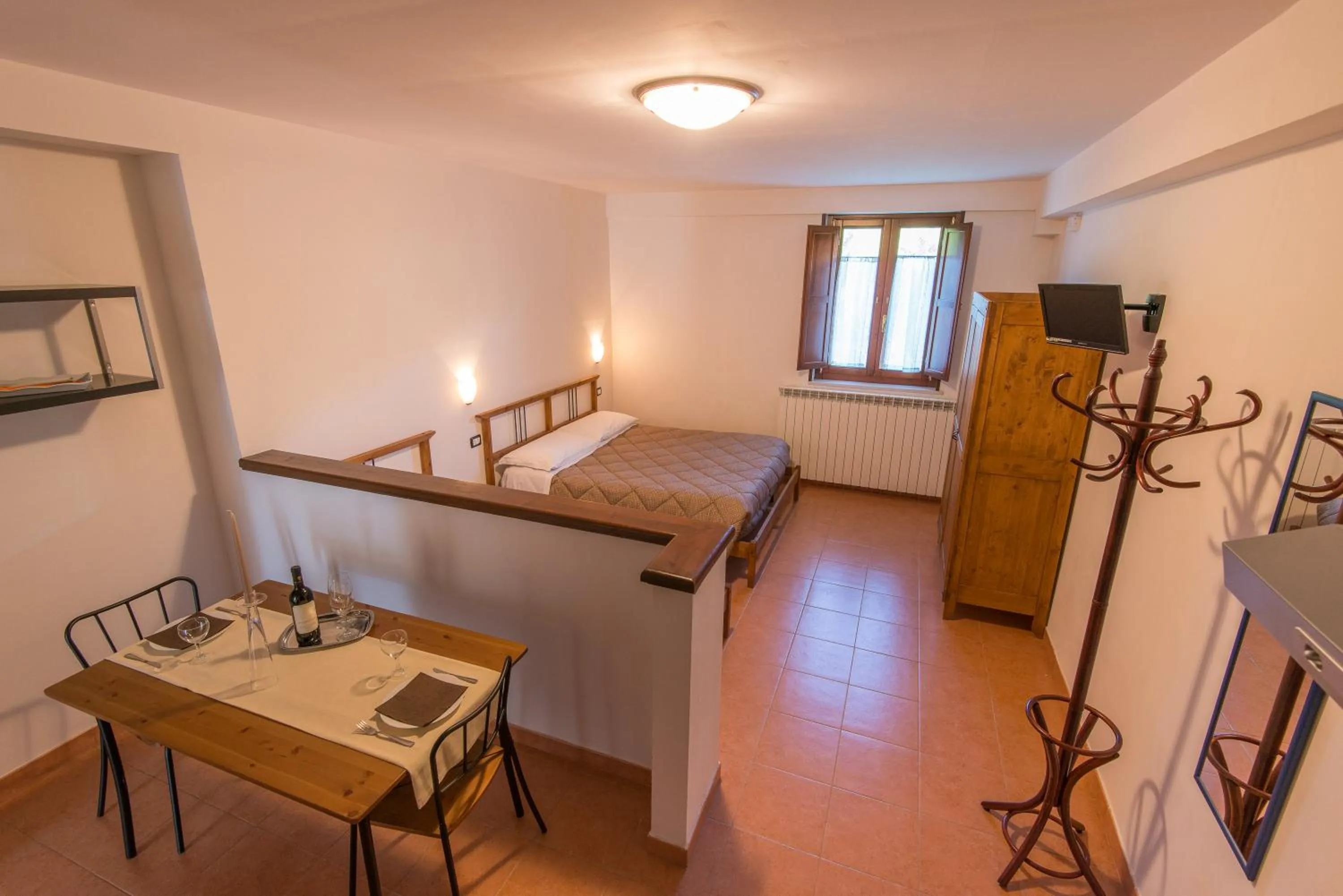 Kitchen or kitchenette, Bed in Albergo Della Corte