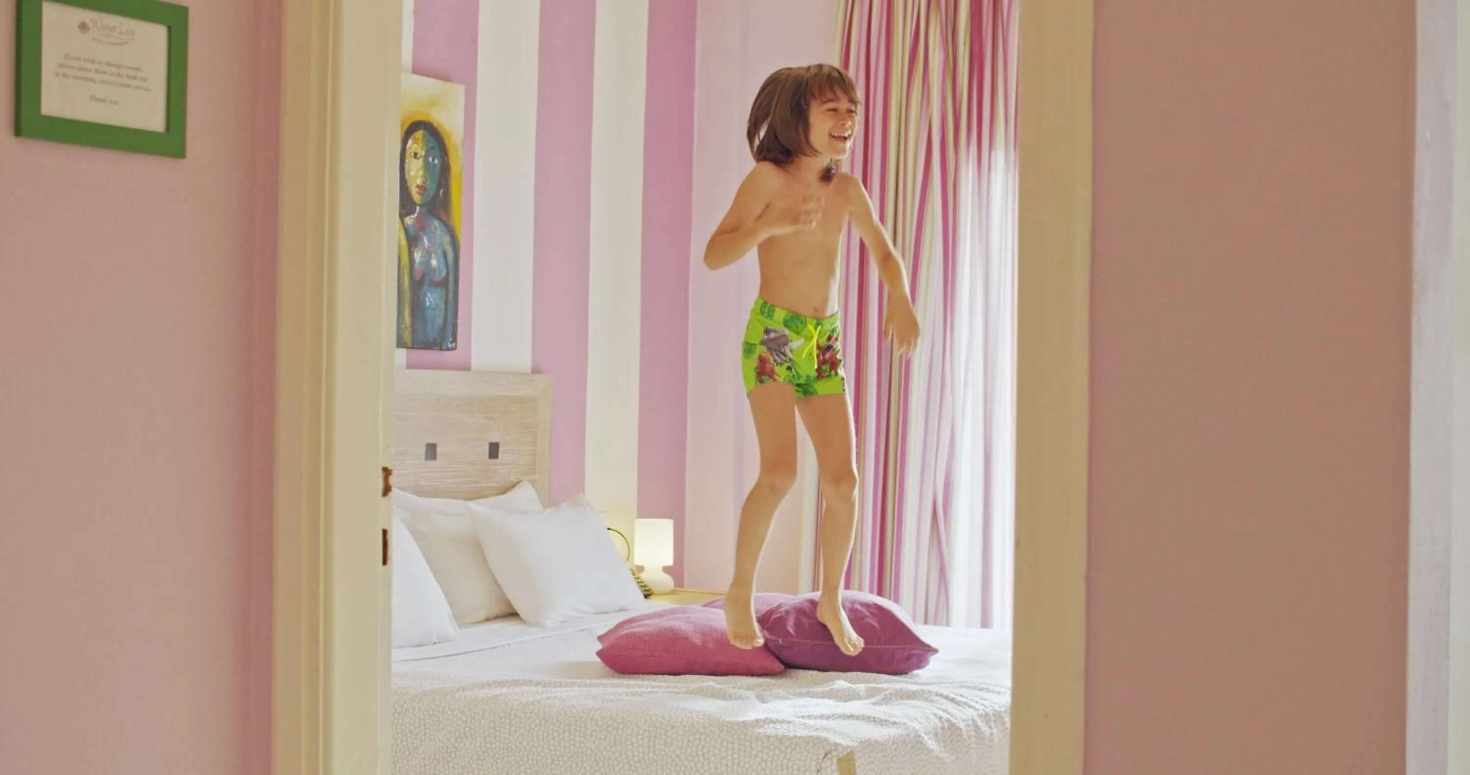 Bed in Waterlily Hotel Apartments