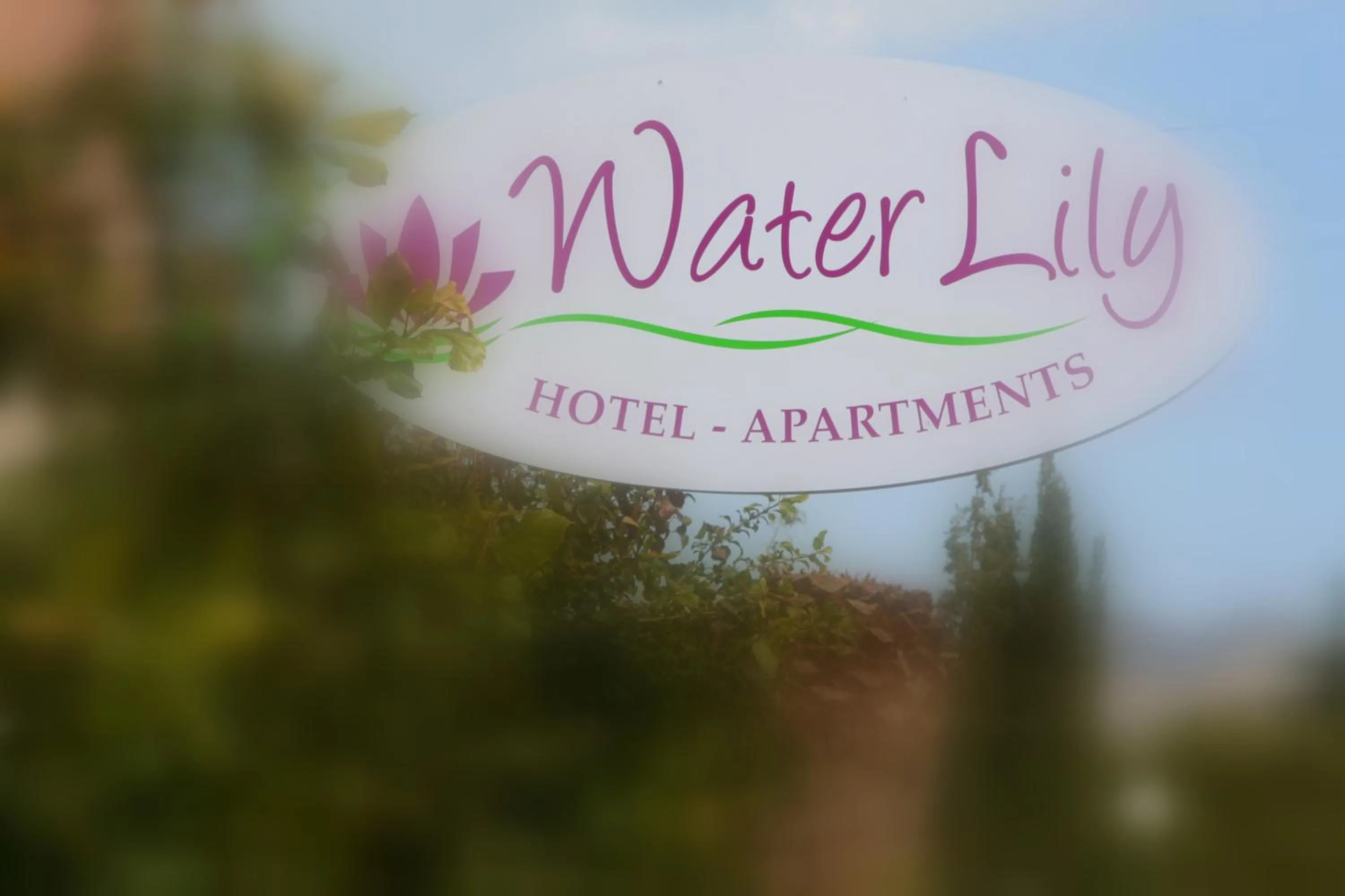Property logo or sign in Waterlily Hotel Apartments