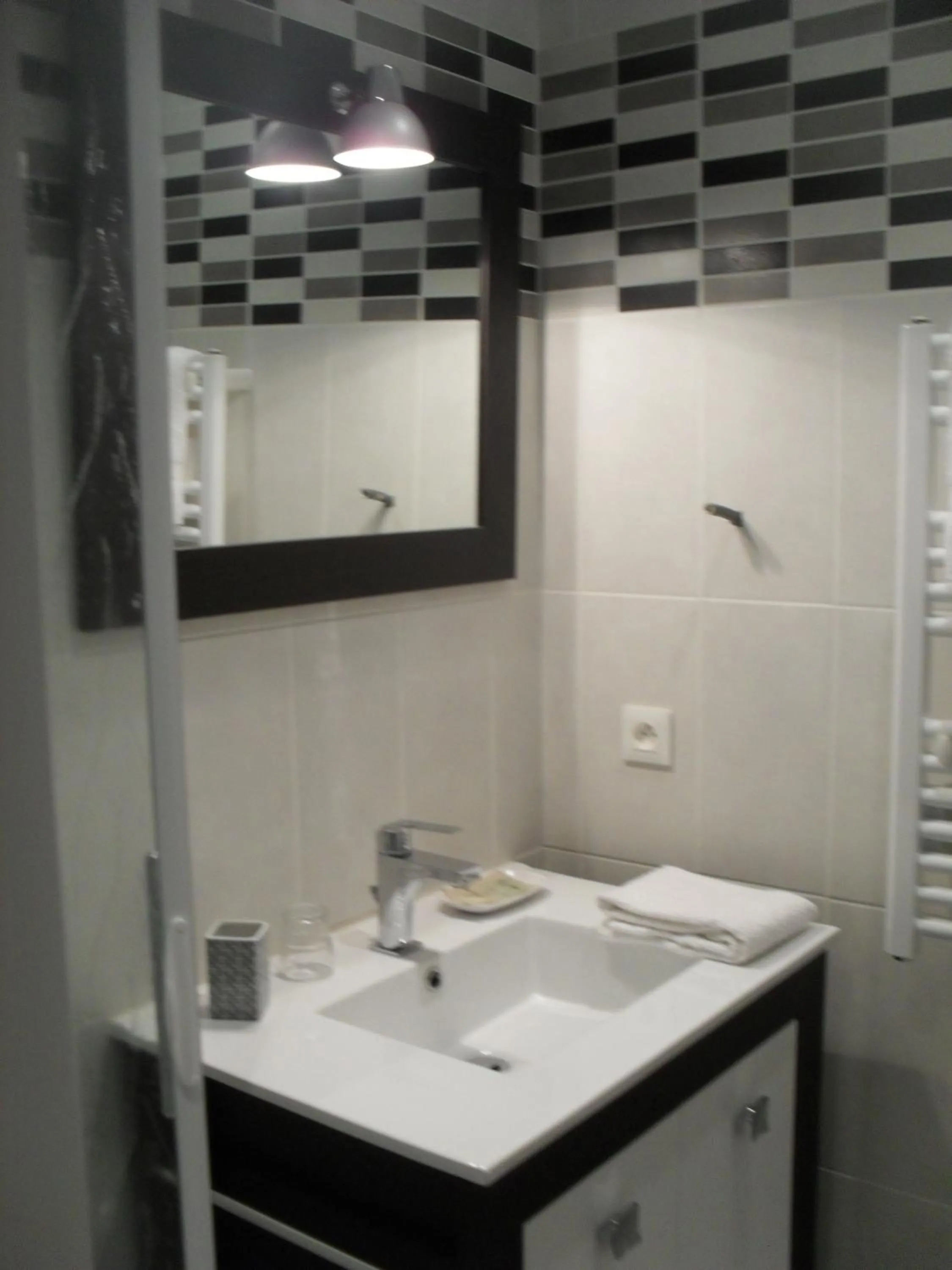 Bathroom in Logis Hôtel Andreinia & Cabanes